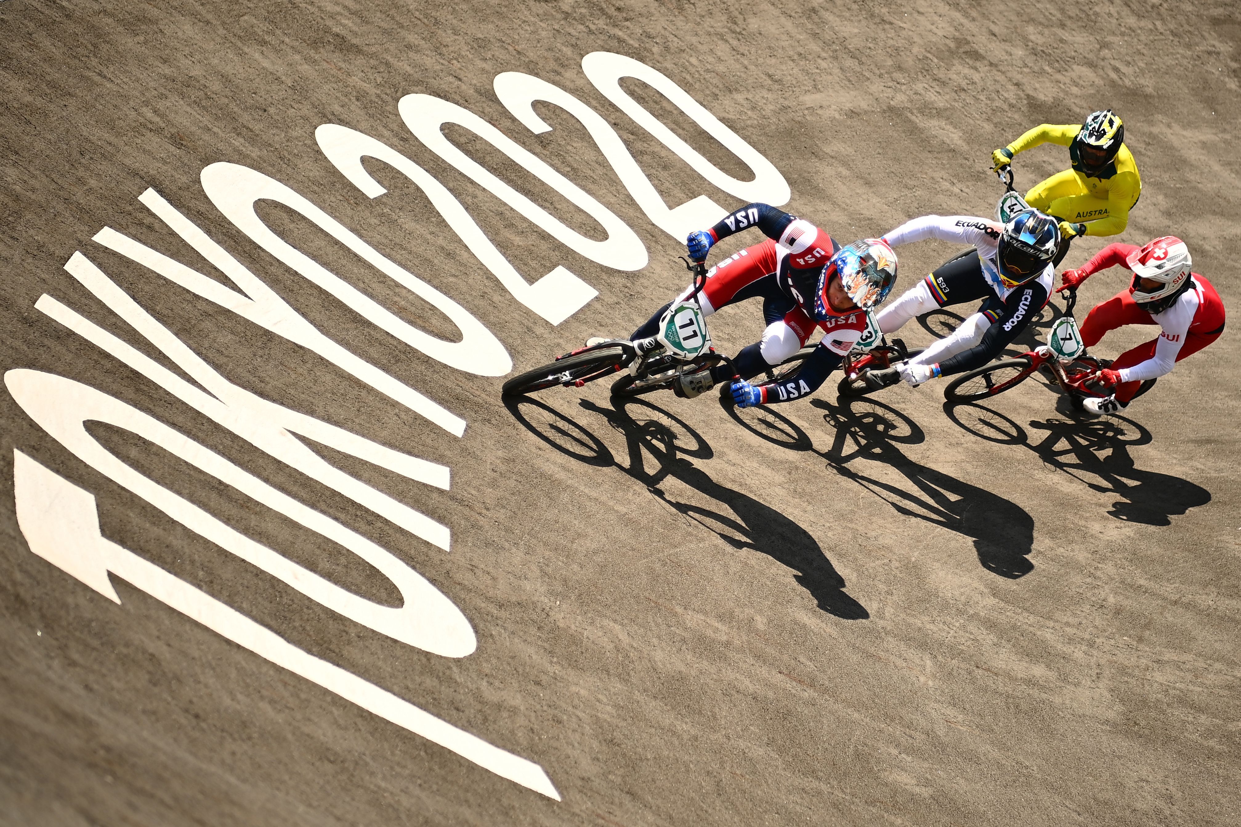 The BMX racing men's quarter-finals run at the Ariake Urban Sports Park during the Tokyo 2020 Olympic Games in Tokyo on July 29