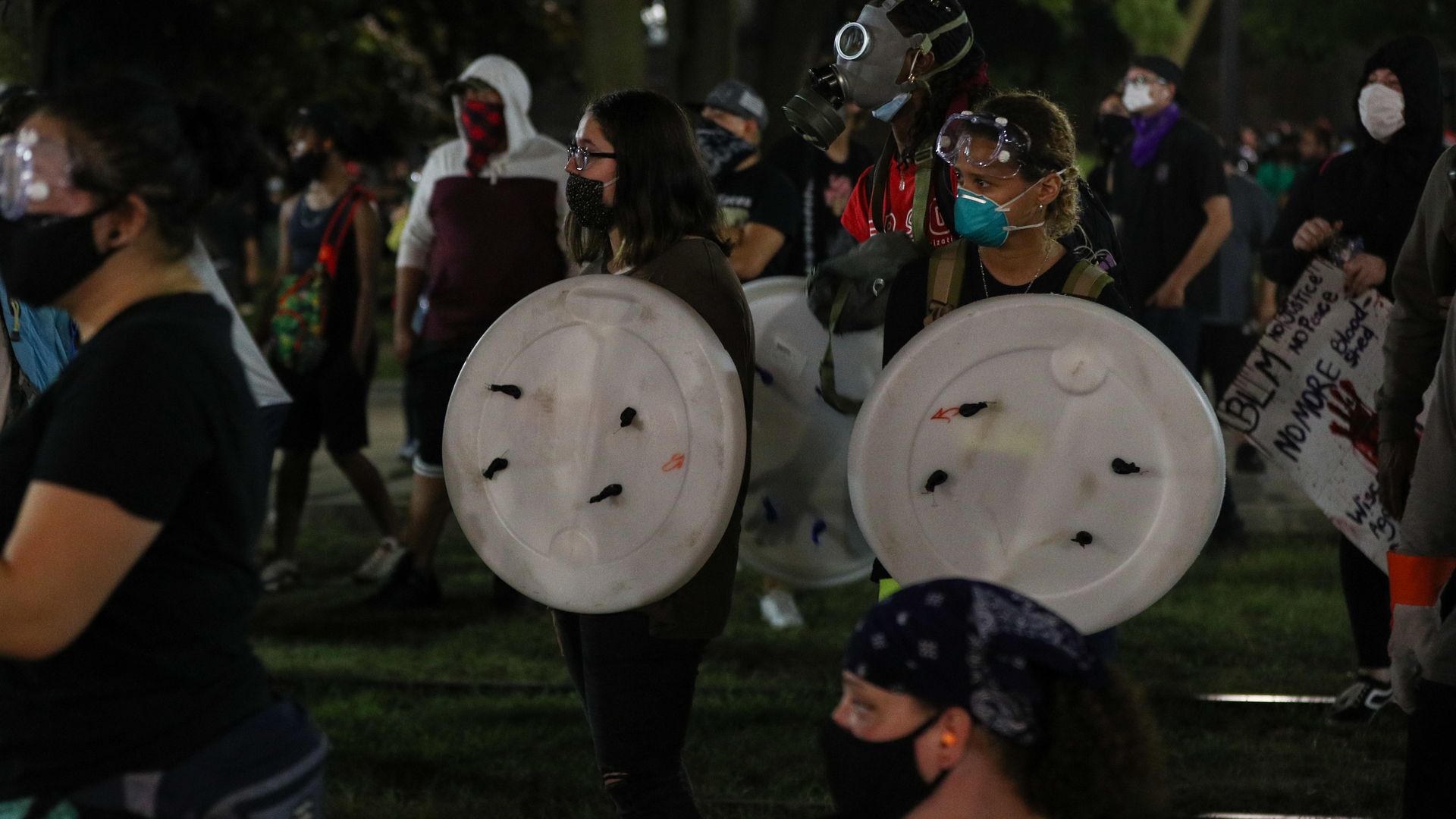 Police take security measurements during a third night of unrest on August 25, 2020 in Kenosha