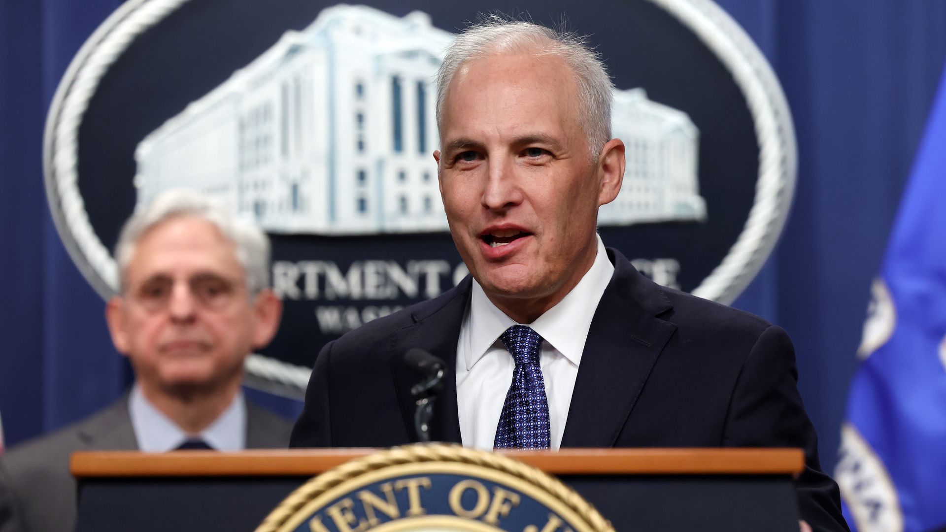 Assistant Attorney General for National Security Matthew Olsen (R) and U.S. Attorney General Merrick Garland speak at a press conference at the U.S. Department of Justice on on October 24, 2022 in Washington, DC.