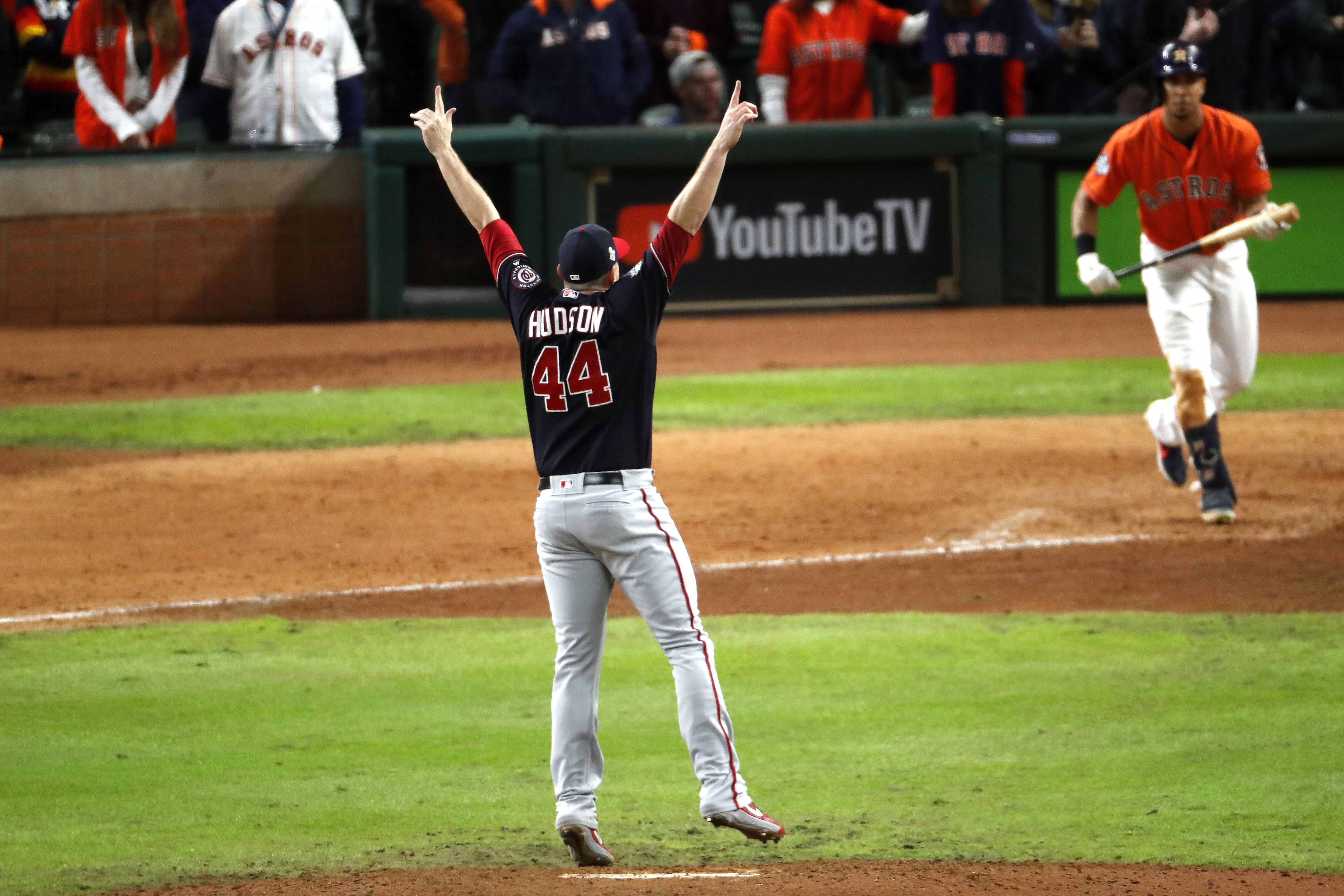 Daniel Hudson #44 of the Washington Nationals celebrates after striking out Michael Brantley #23 of the Houston Astros 