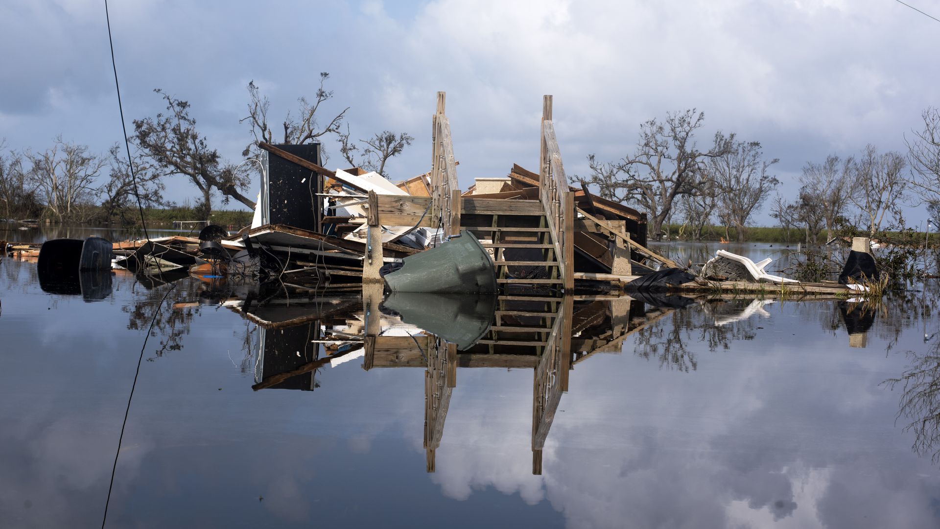 Photo of a destroyed home in floodwater