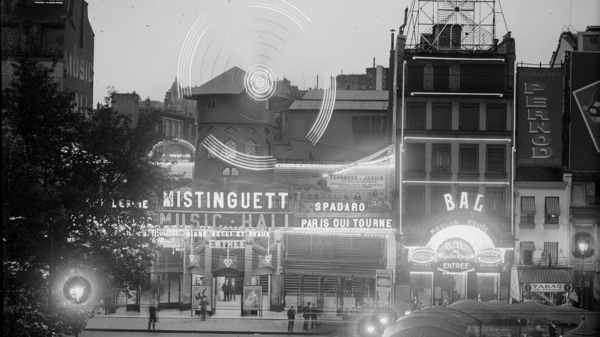 Back and white photo of neon signage on the Moulin Rouge