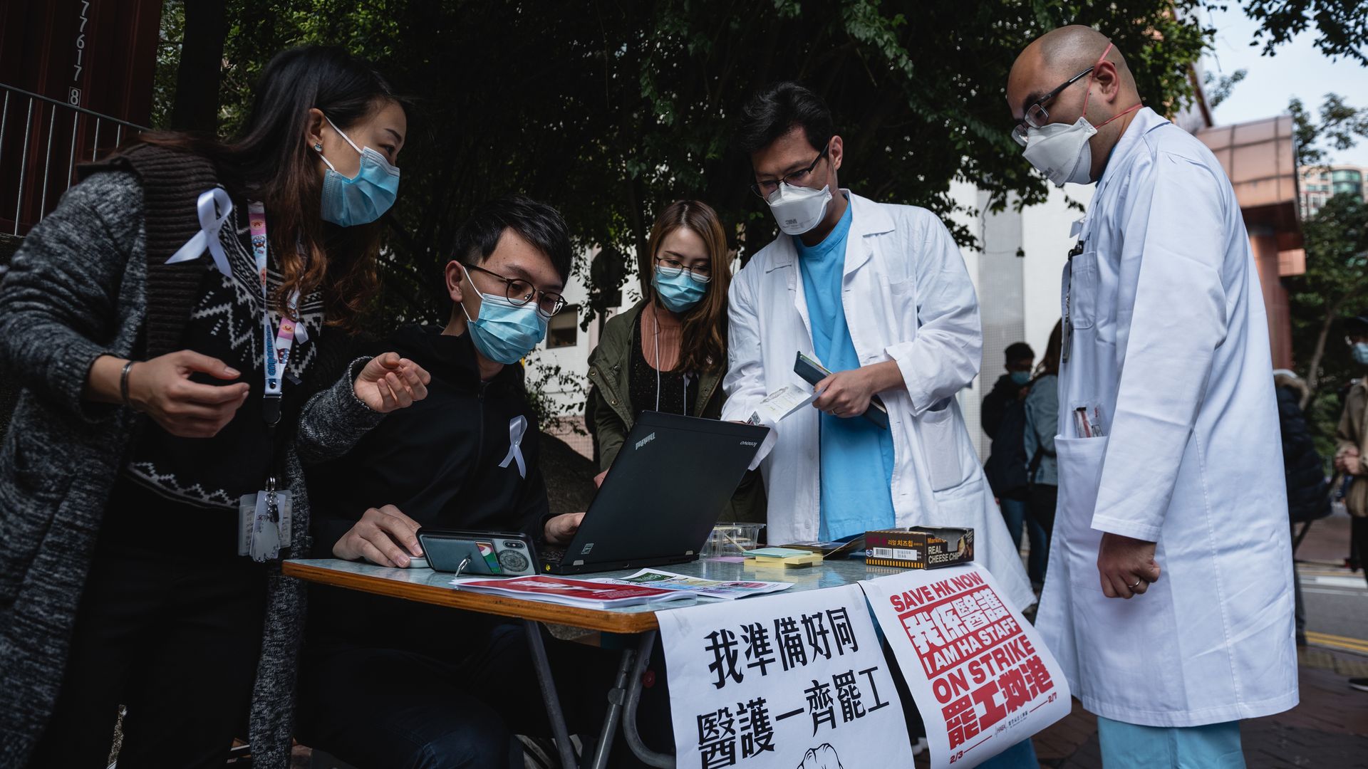 Doctors register for the medical workers strike in support of the Hong Kong-mainland border closure