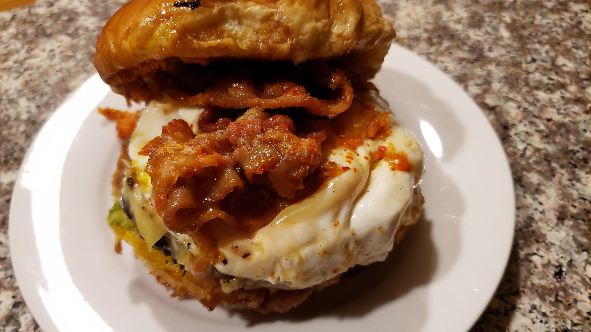 a Korean-style hamburger on a plate. 