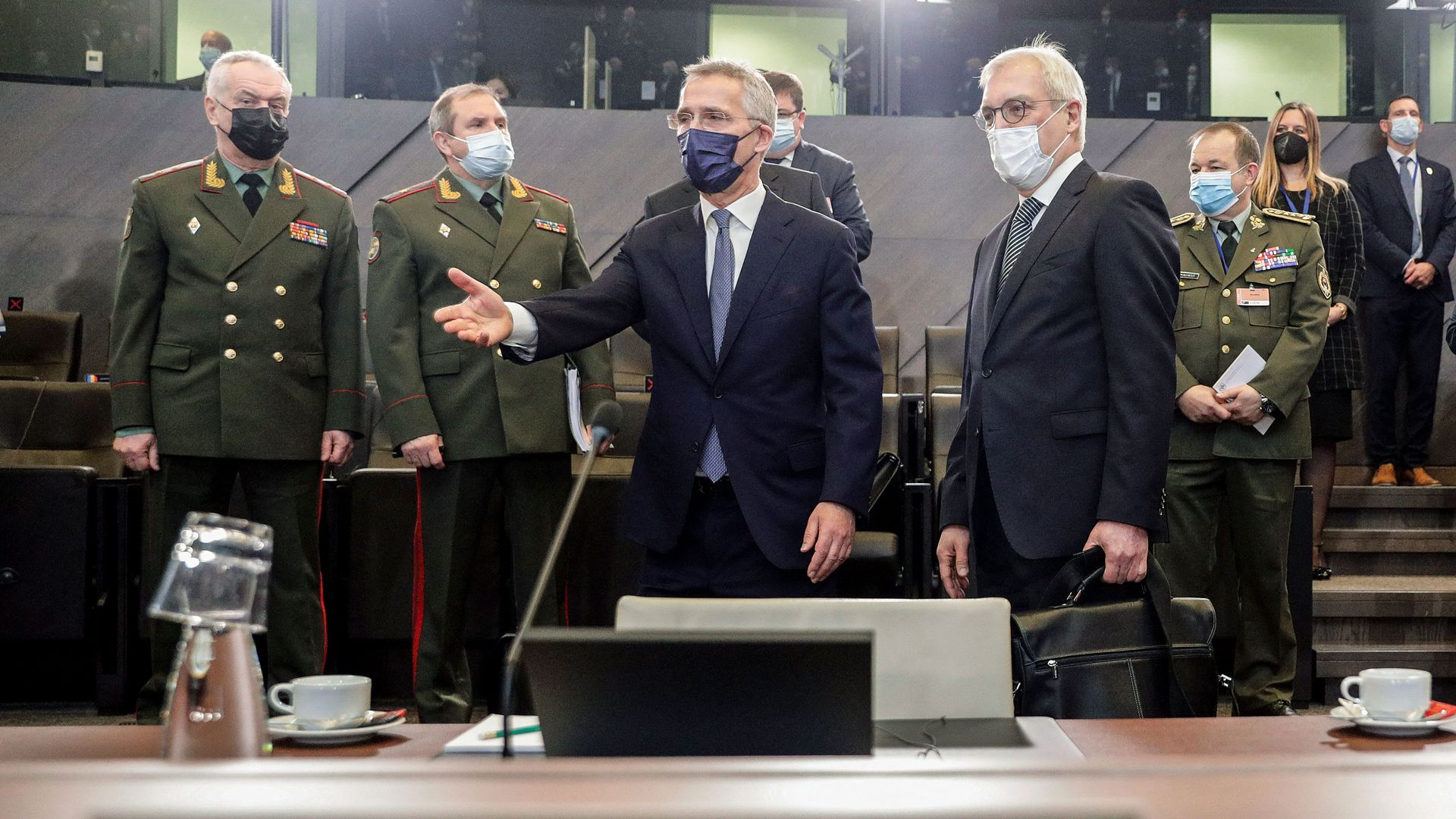 Jens Stoltenberg with Russian officials