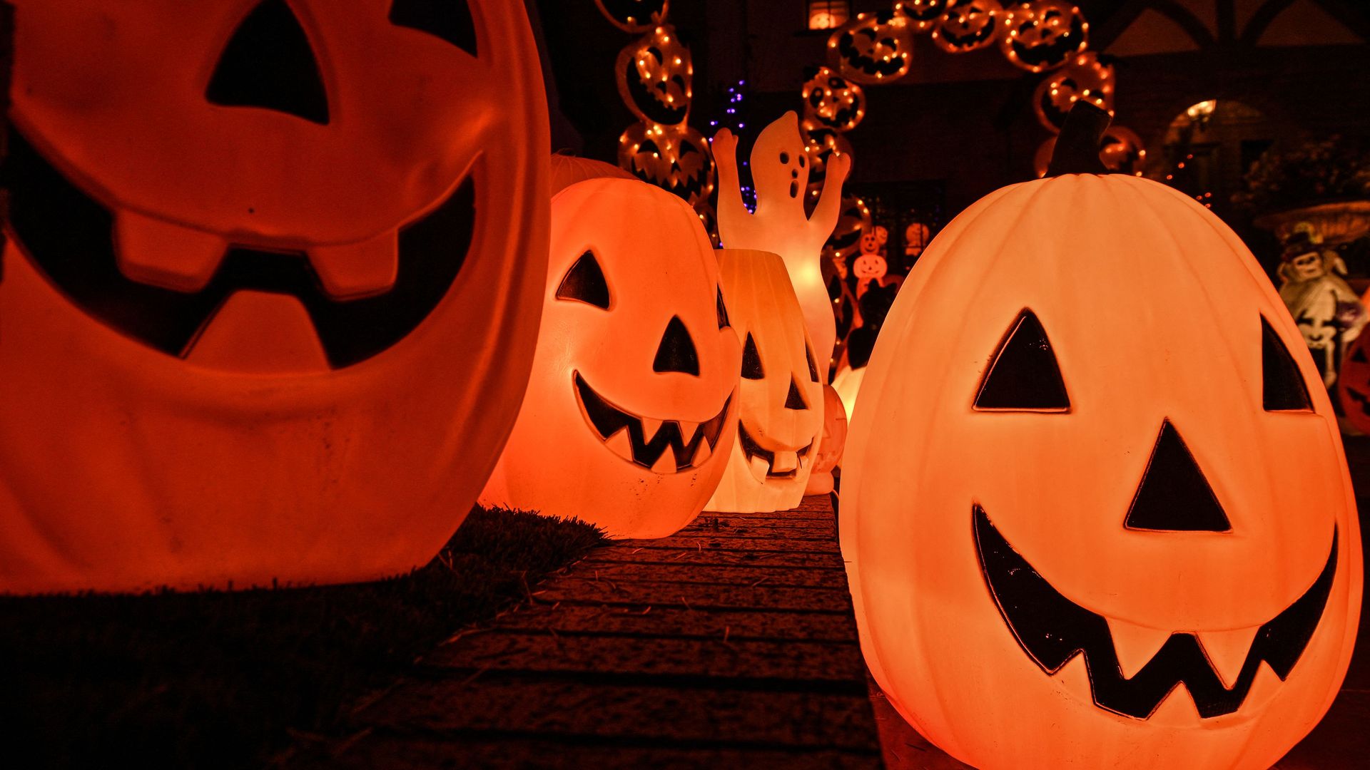 Halloween decorations including giant pumpkins lit up