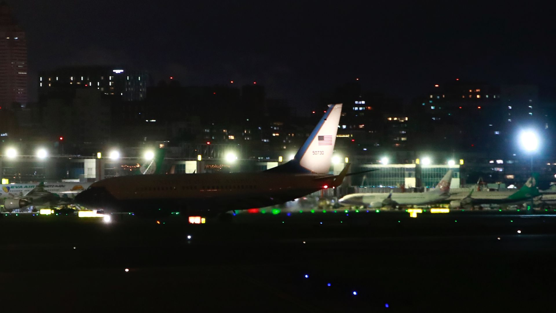 A US Air Force aircraft Boeing C-40C flight SPAR11 carrying a delegation to Taiwan taxis on runway after landing at Songshan International Airport on November 25. 