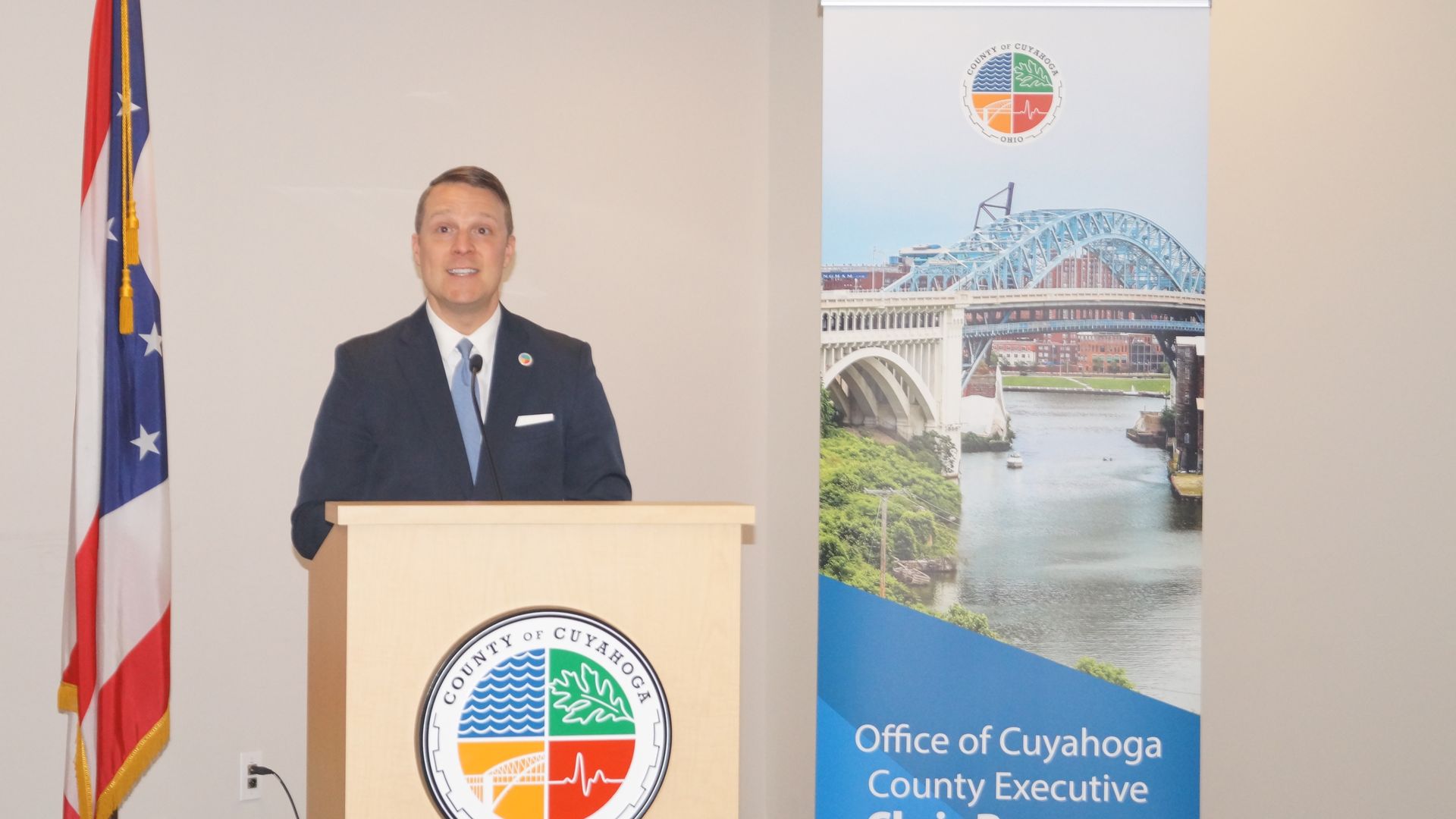 Cuyahoga County treasurer Brad Cromes at a lectern