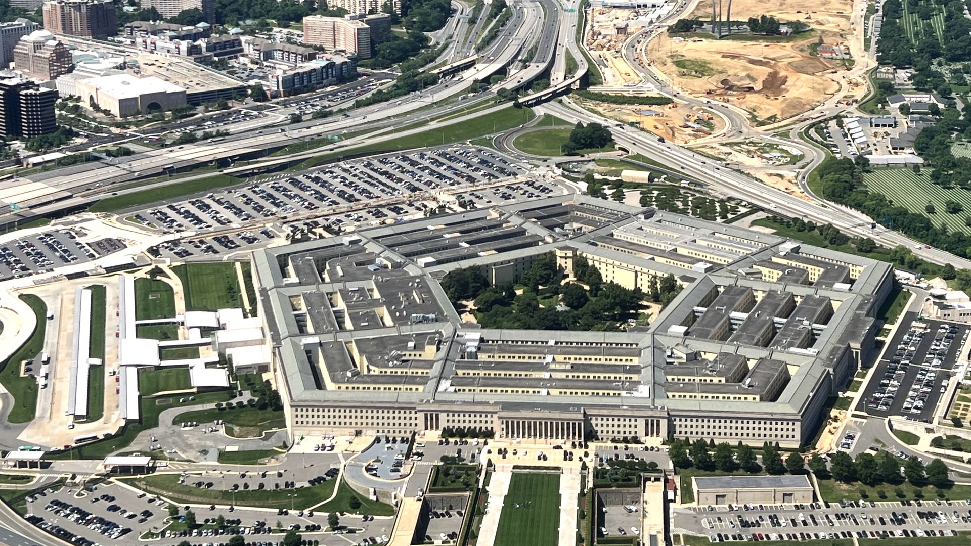 An aerial view of the Pentagon and its surroundings, including the U.S. Air Force memorial.
