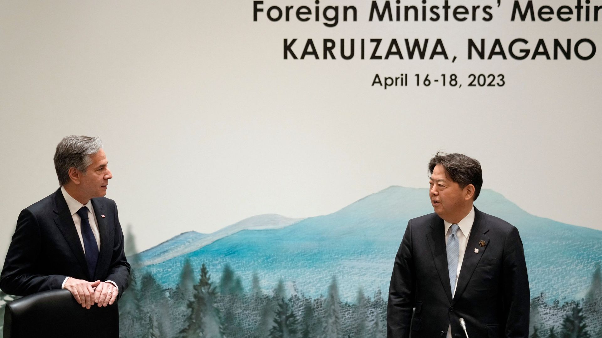 Japan's Foreign Minister Yoshimasa Hayashi (R) speaks to US Secretary of State Antony Blinken at the start of the first working session of a G7 Foreign ministers' meeting at the Prince Karuizawa hotel in Karuizawa on April 17.