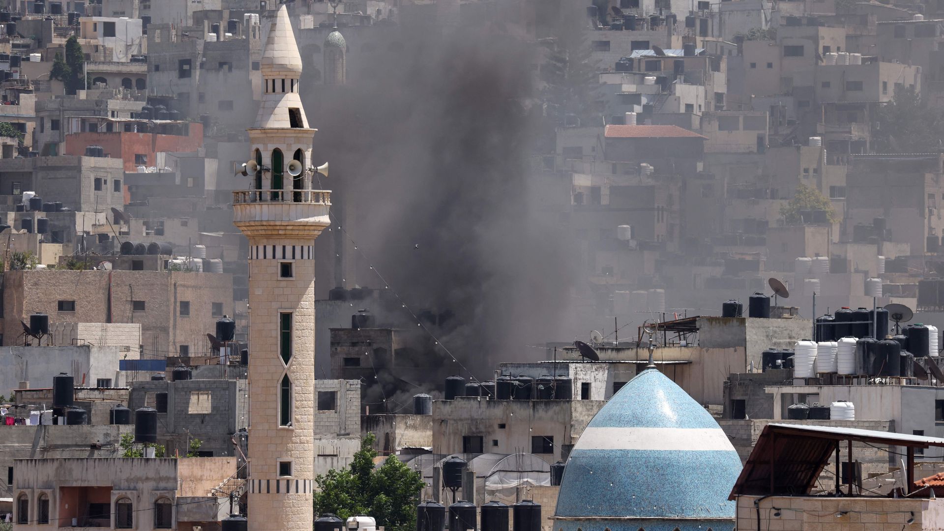 Smoke billows during an Israeli military operation in Jenin city in the occupied West Bank, on July 3, 2023.
