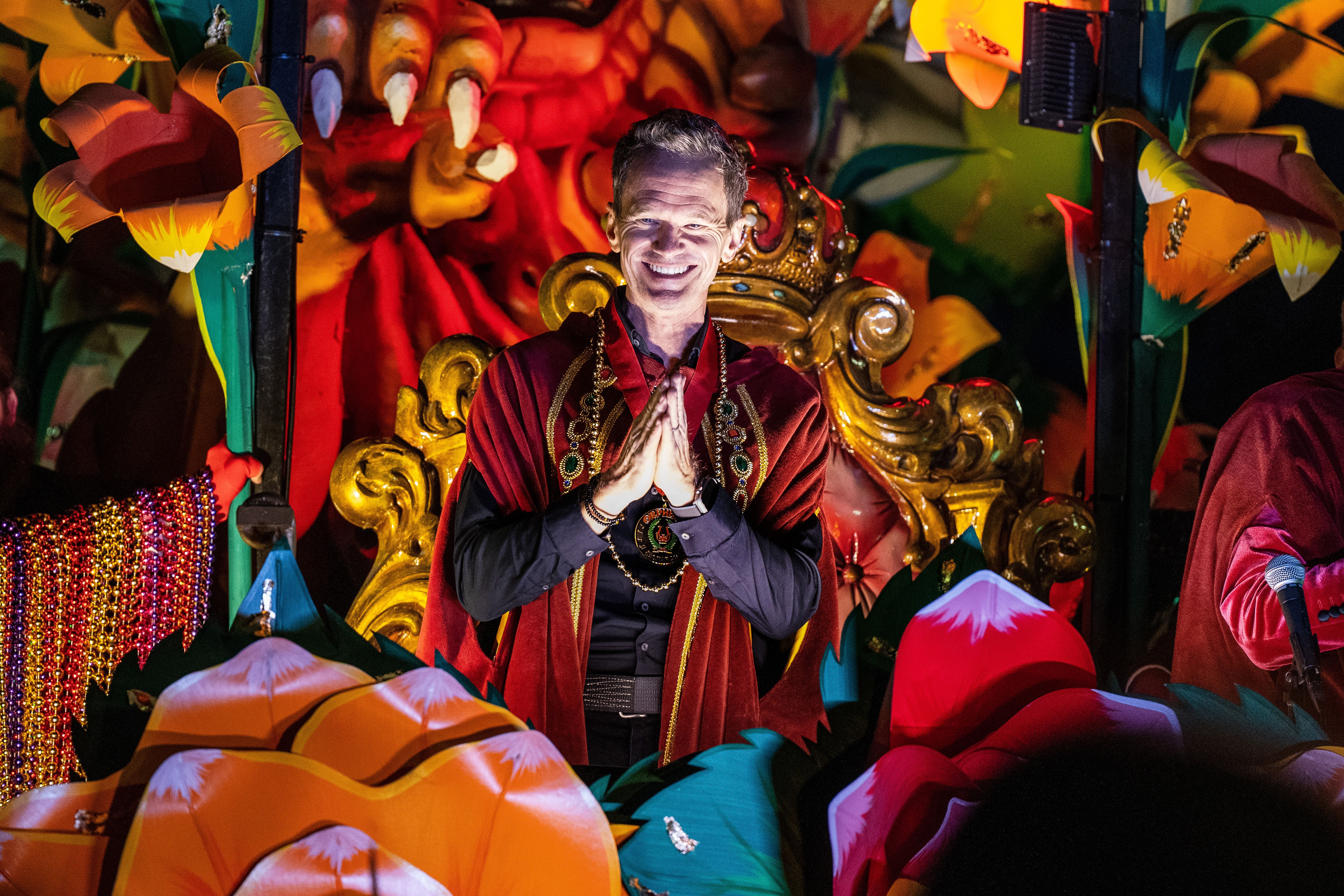 Photo shows Neil Patrick Harris on a float in the Krewe of Orpheus
