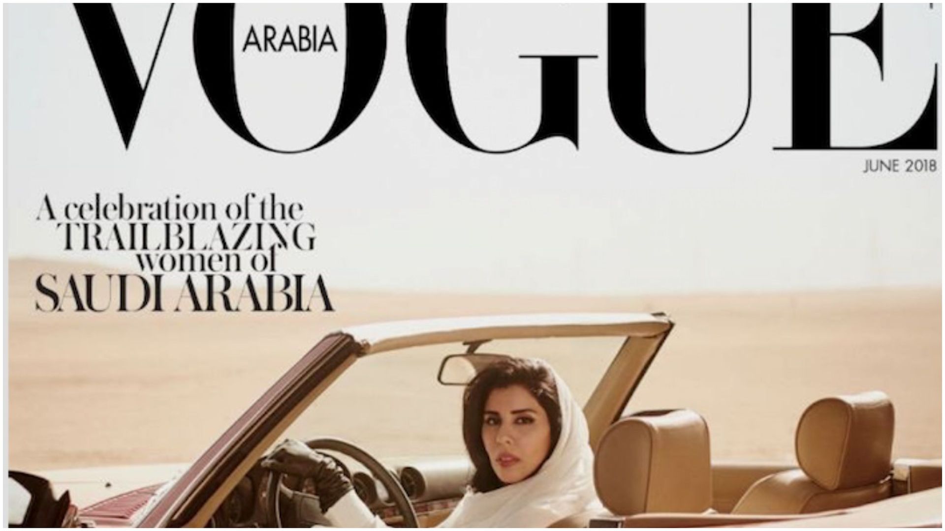  Saudi Princess Hayfa bint Abdullah al-Saud poses behind the wheel of a convertible