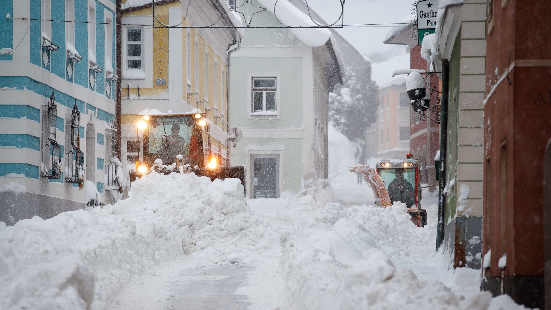 Photo of a lot of snow on a street in Austria.
