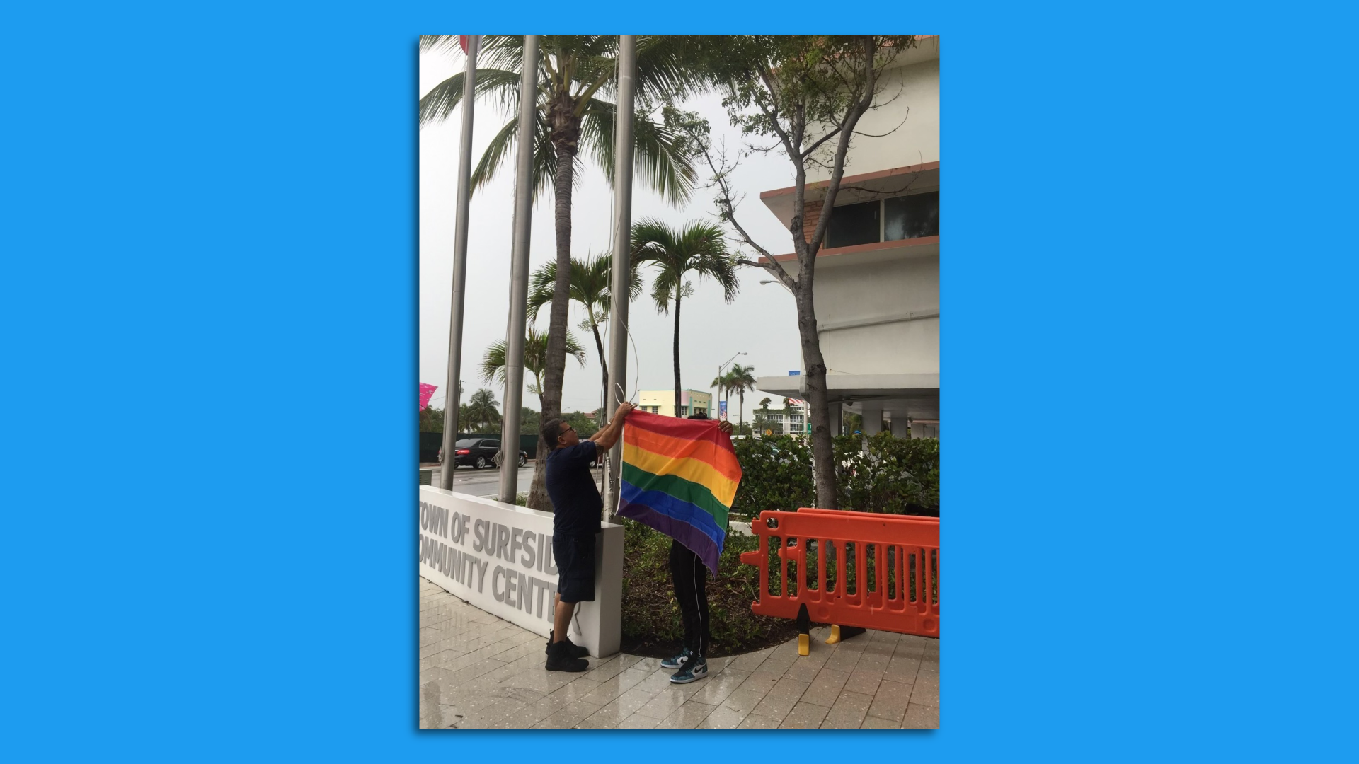 A pride flag is raised in Surfside.