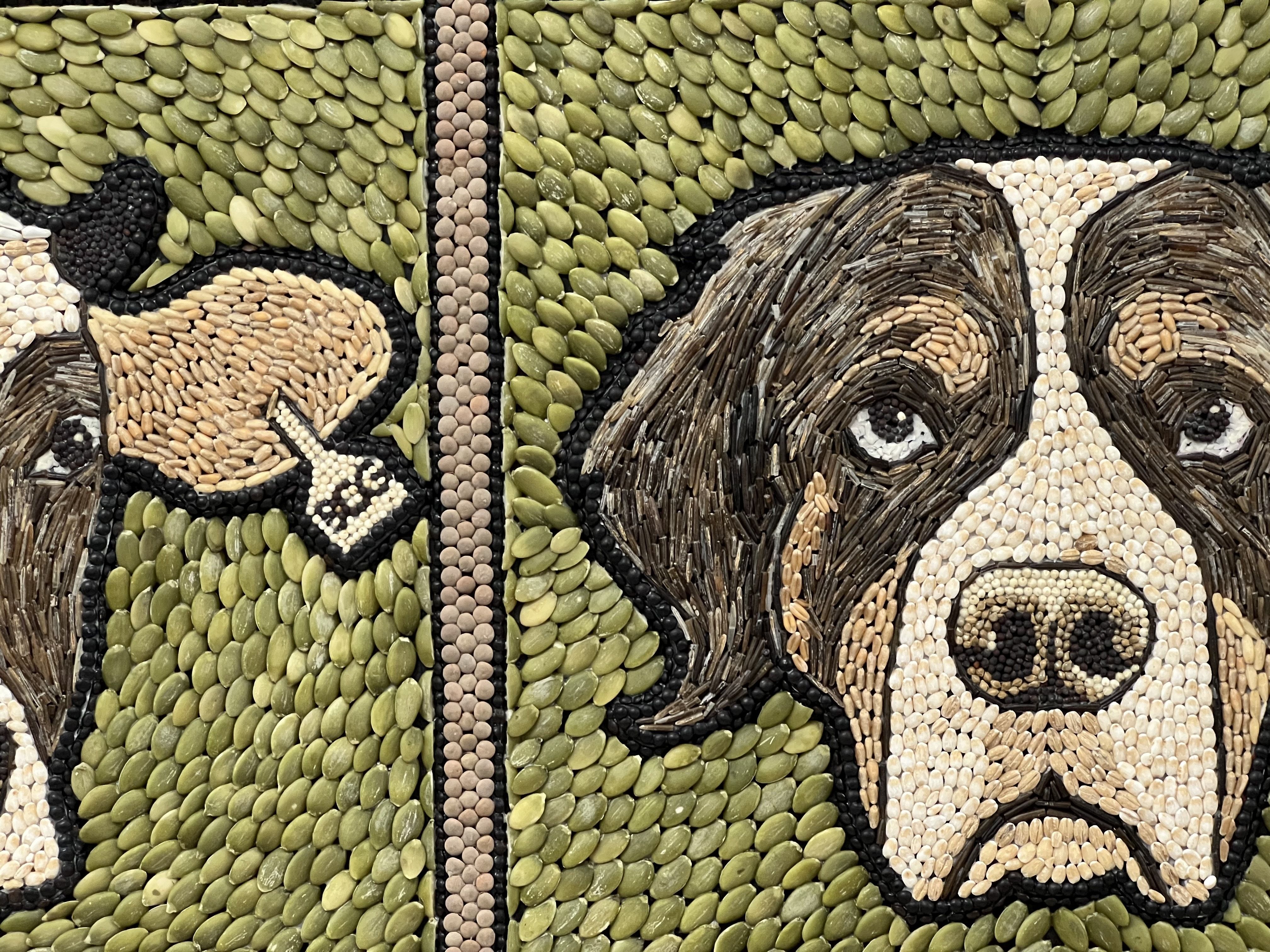 A depiction of a parts of the heads of a cow and a dog on a background of pumpkin seeds