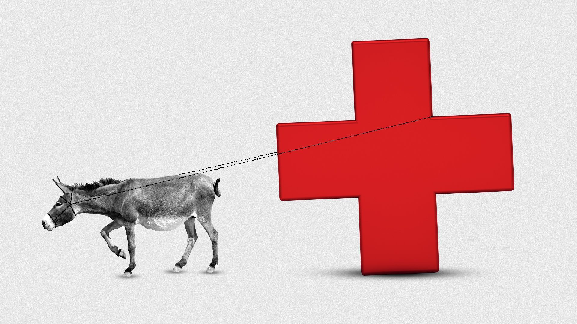 A donkey dragging a large red medical cross.