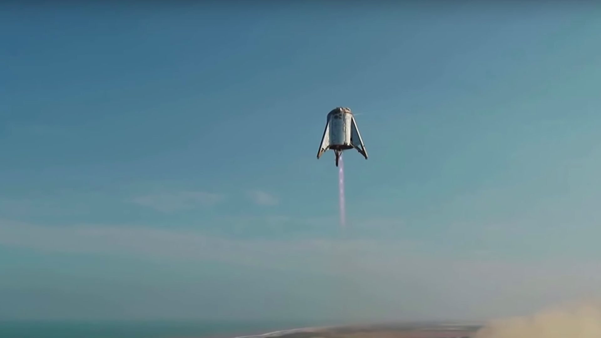 Starhopper flying through the sky above Texas