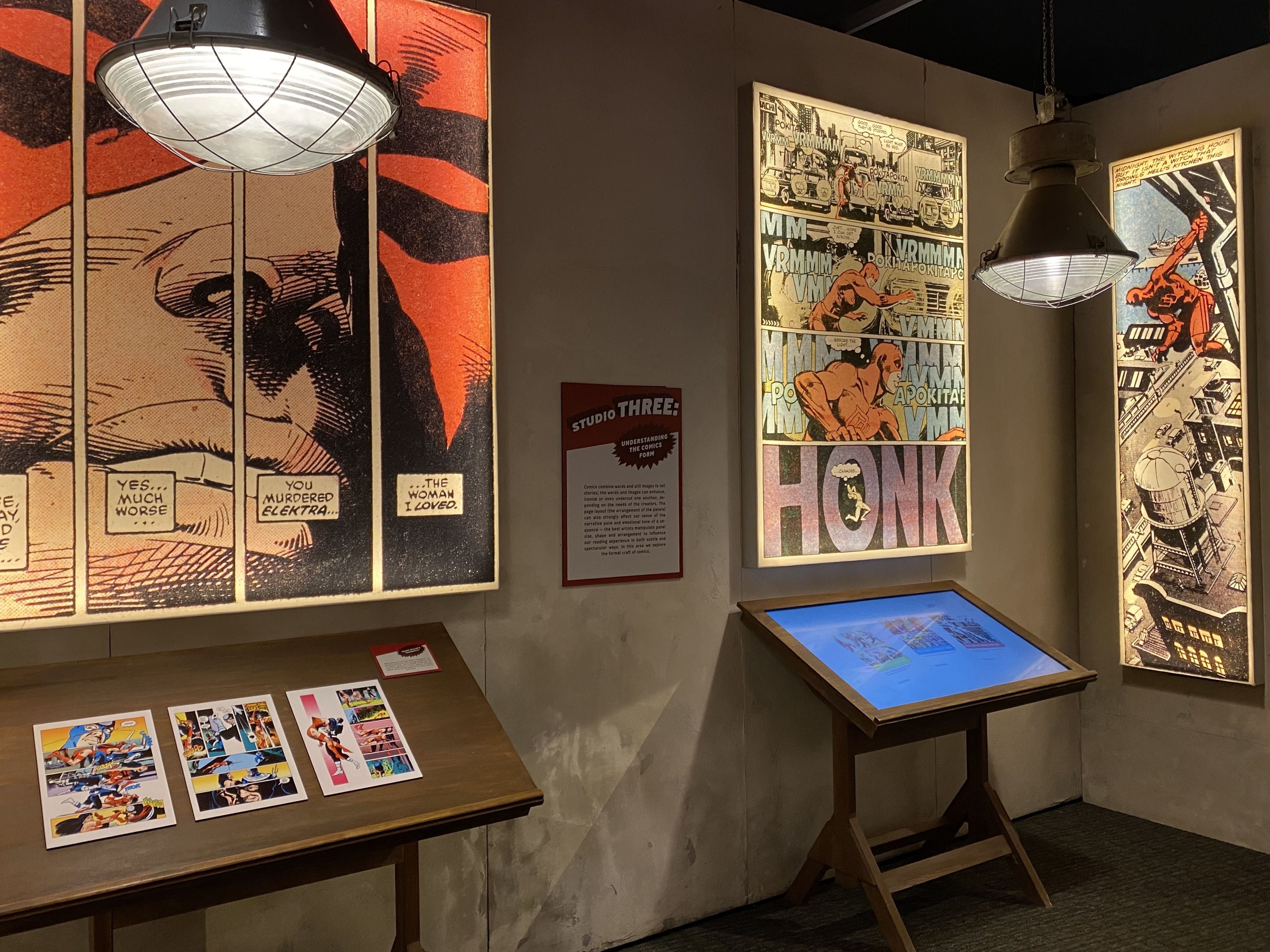 A interactive exhibit explaining how sketches come to life as comics