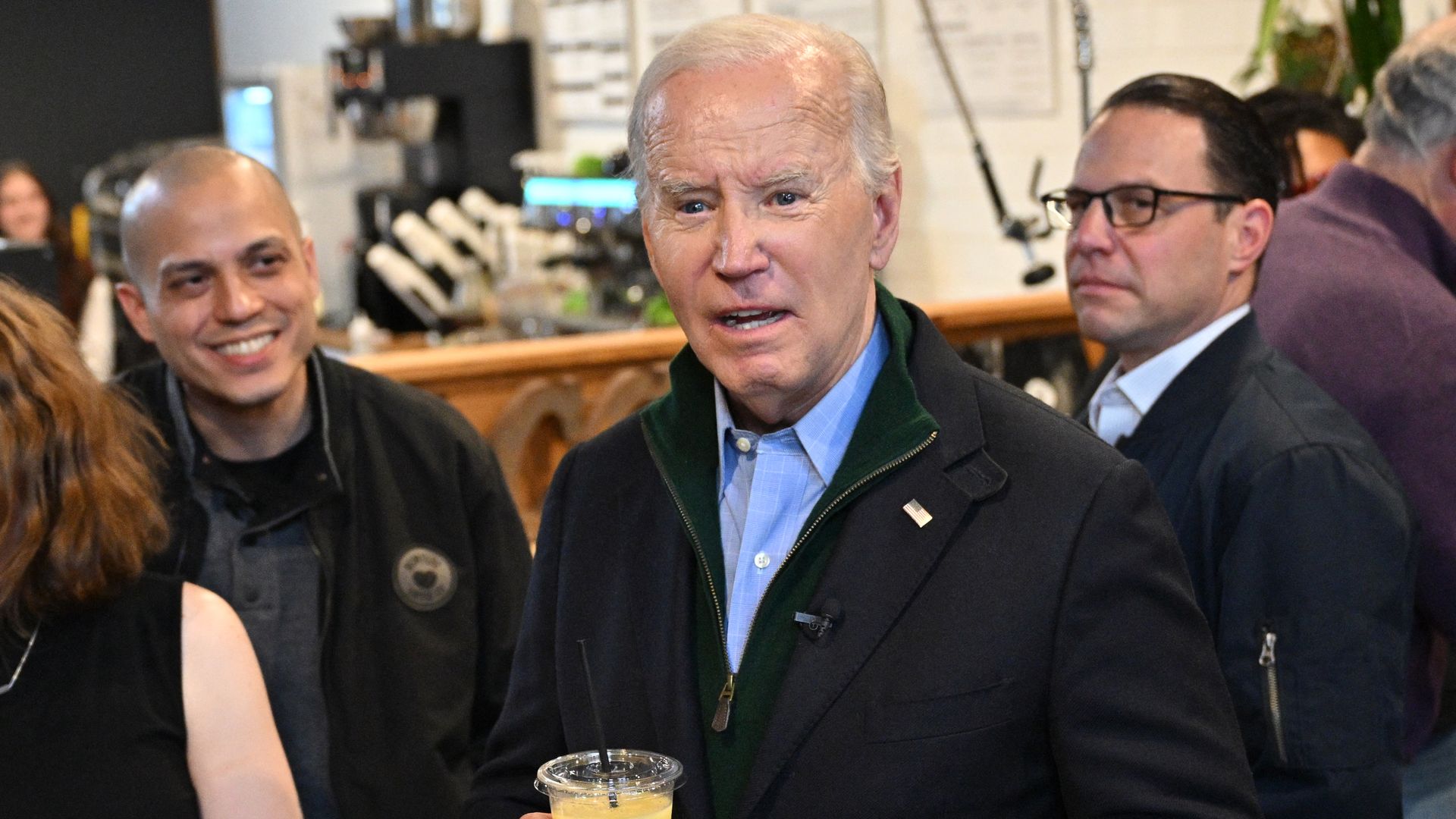 oe Biden speaks to reporters as he visits Nowhere Coffee shop in Emmaus, Pennsylvania, on January 12,