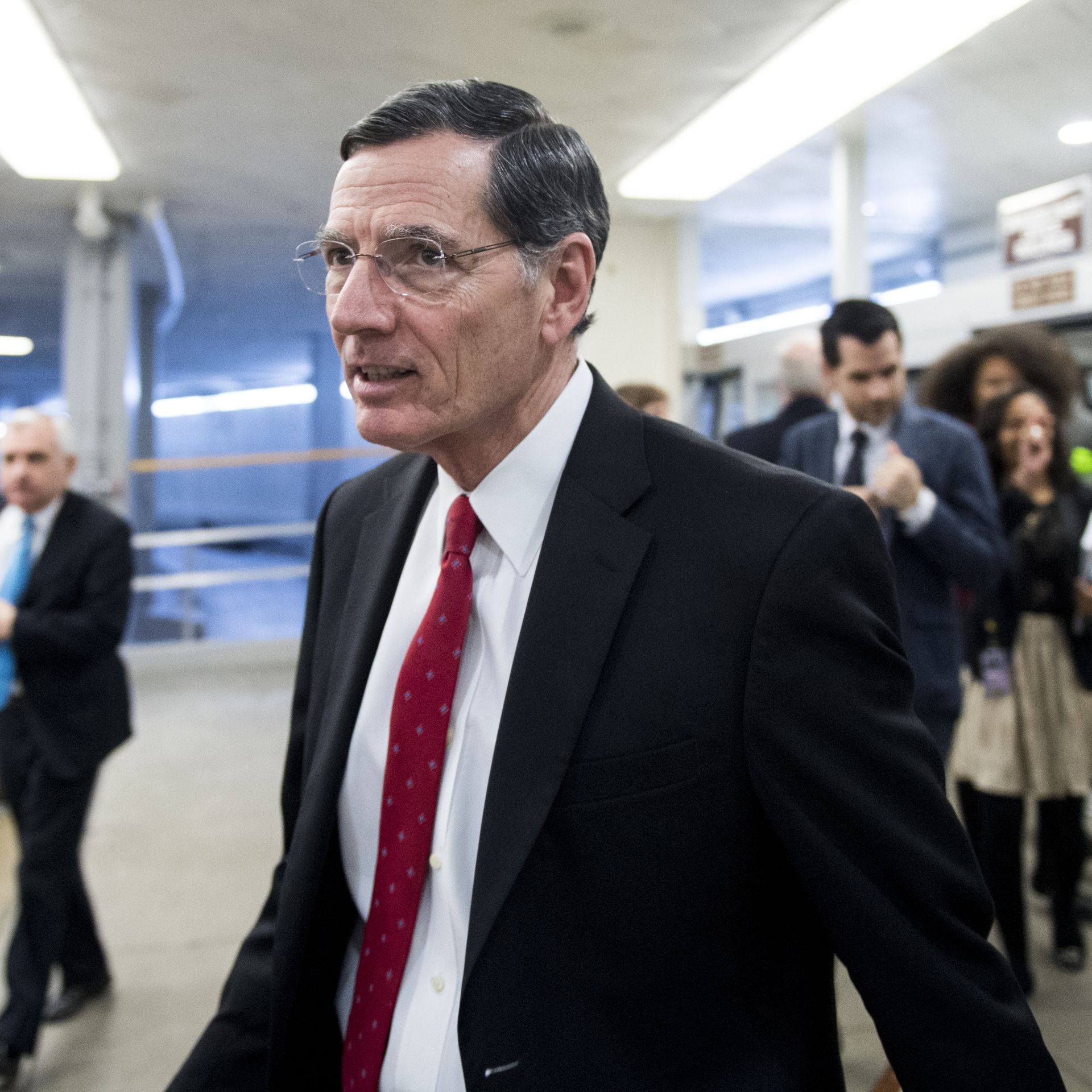 Sen. John Barrasso, R-Wyo., arrives in the Capitol for the Senate policy luncheons on Tuesday, Feb. 26, 2019.