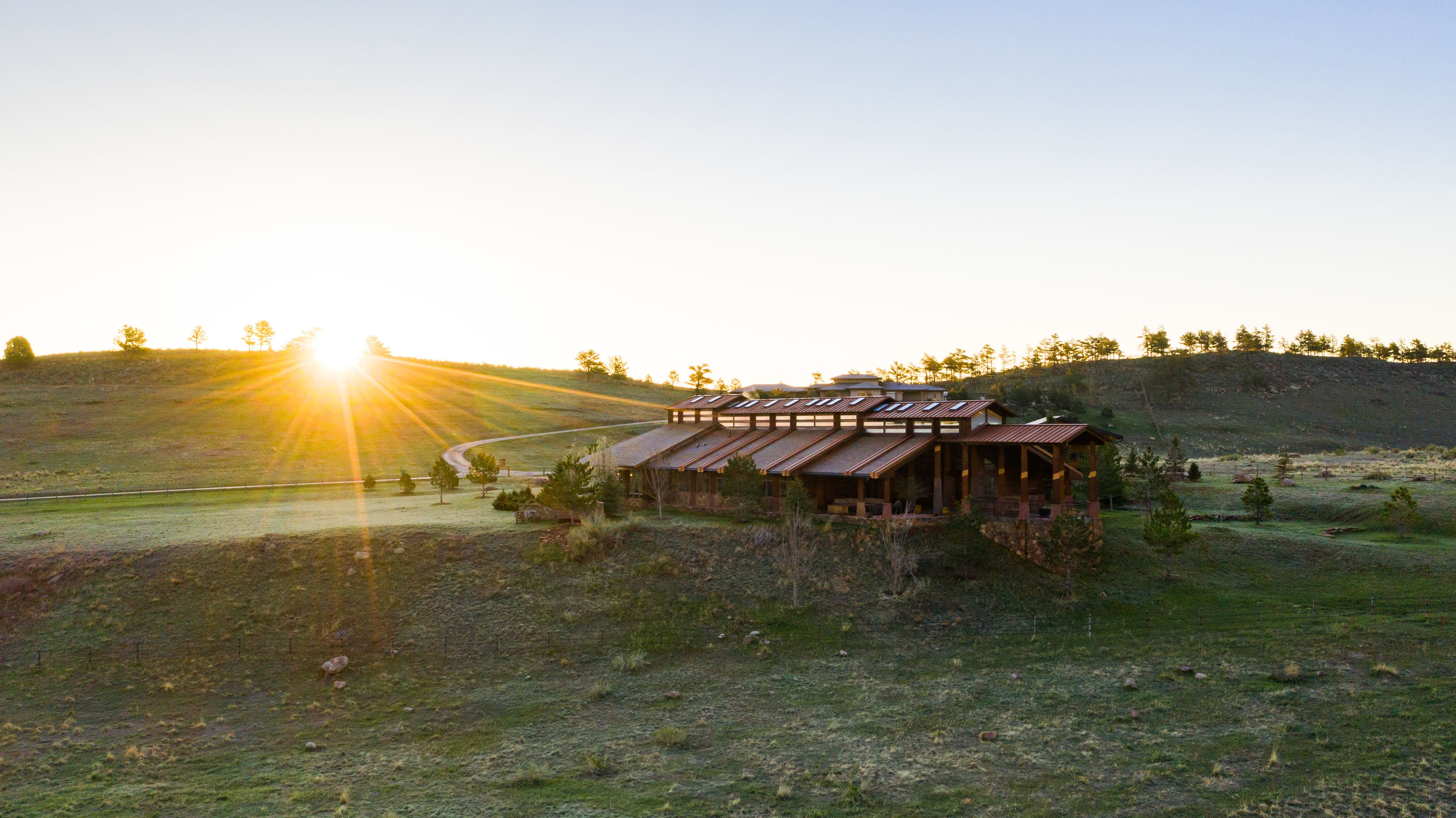 Colorado Mountain house on 35 acres asks $7M exterior sunset