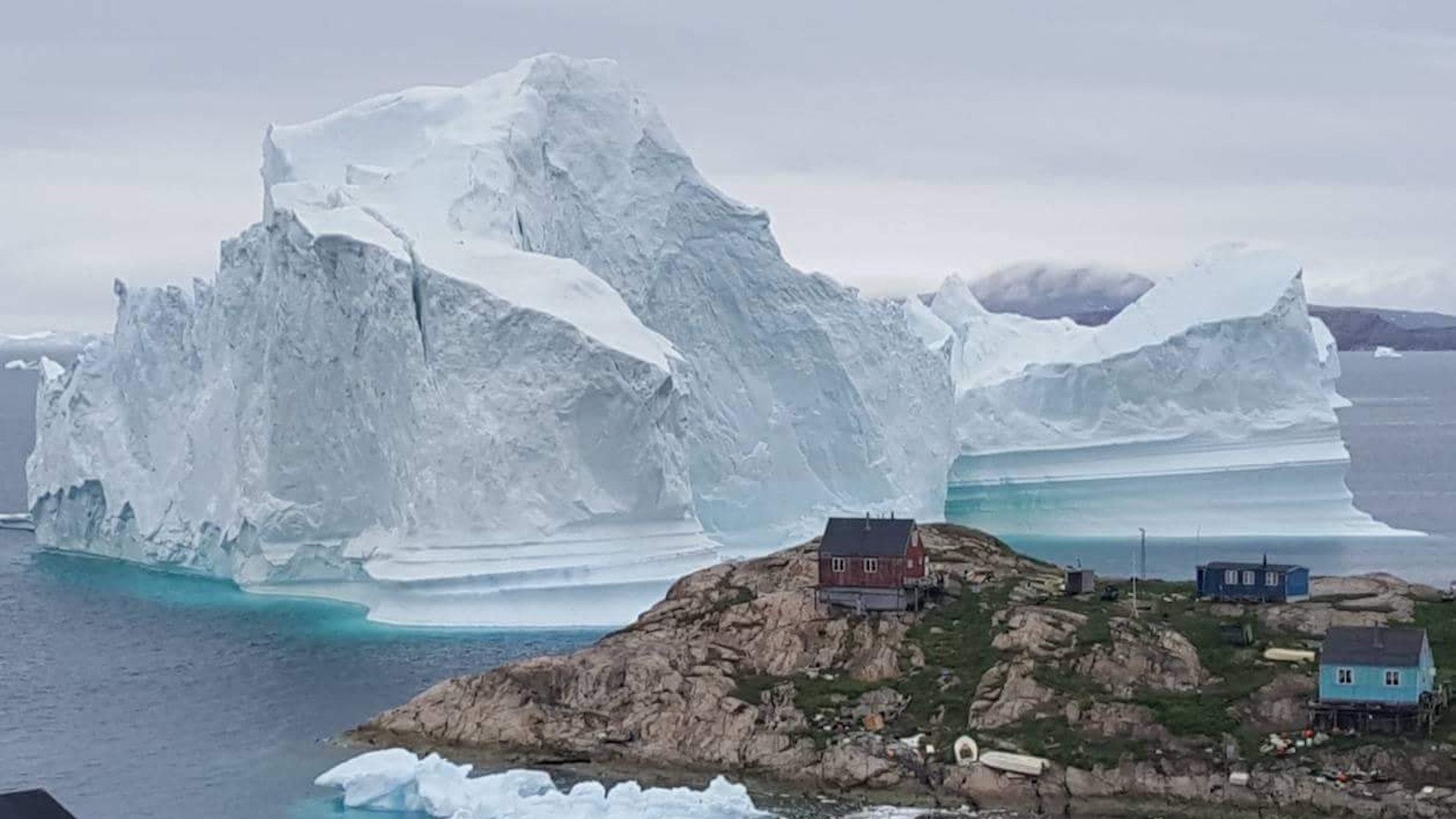 Massive iceberg threatens tiny Greenland village - Axios