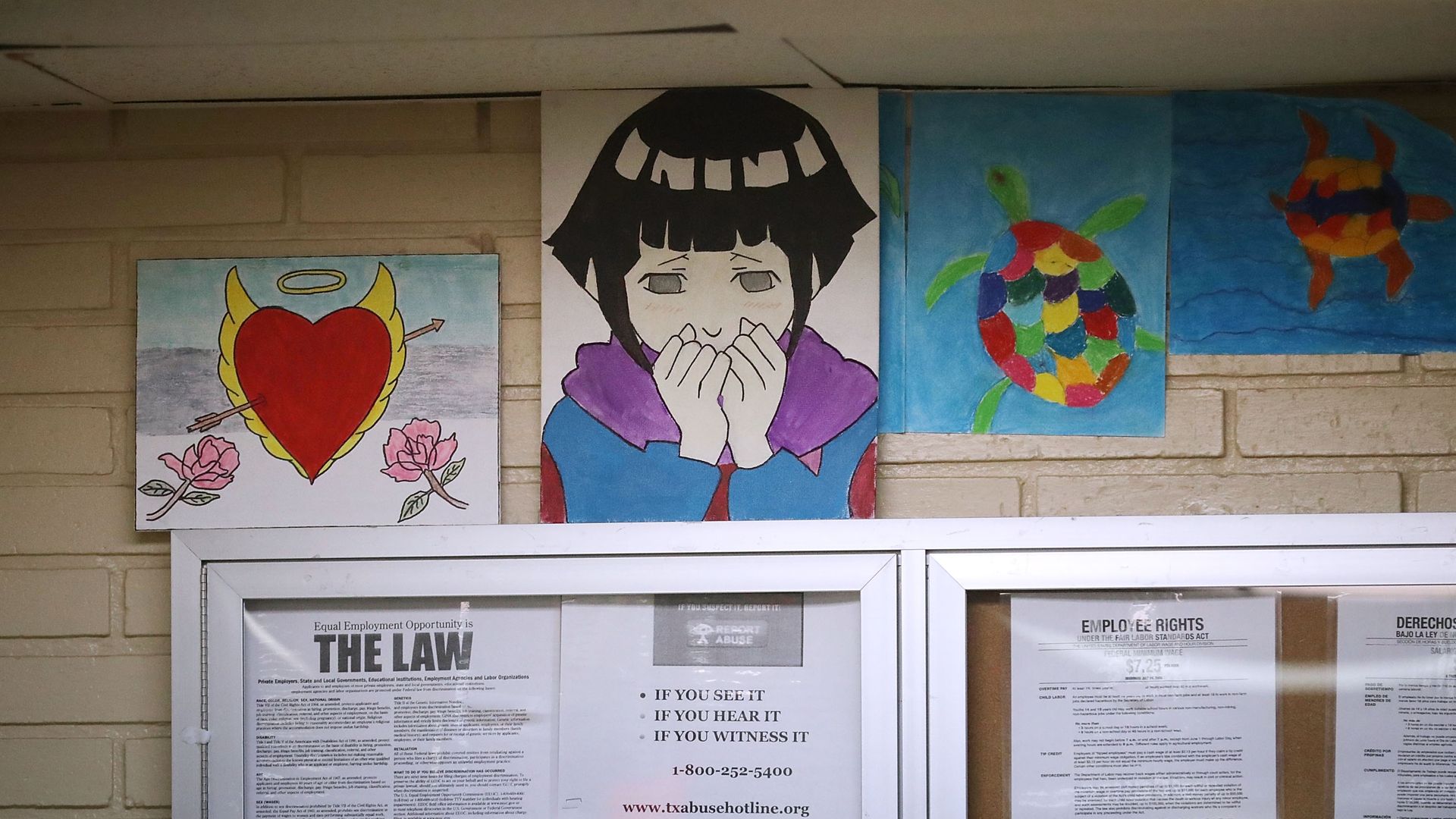 Posters and child paintings in an HHS child shelter