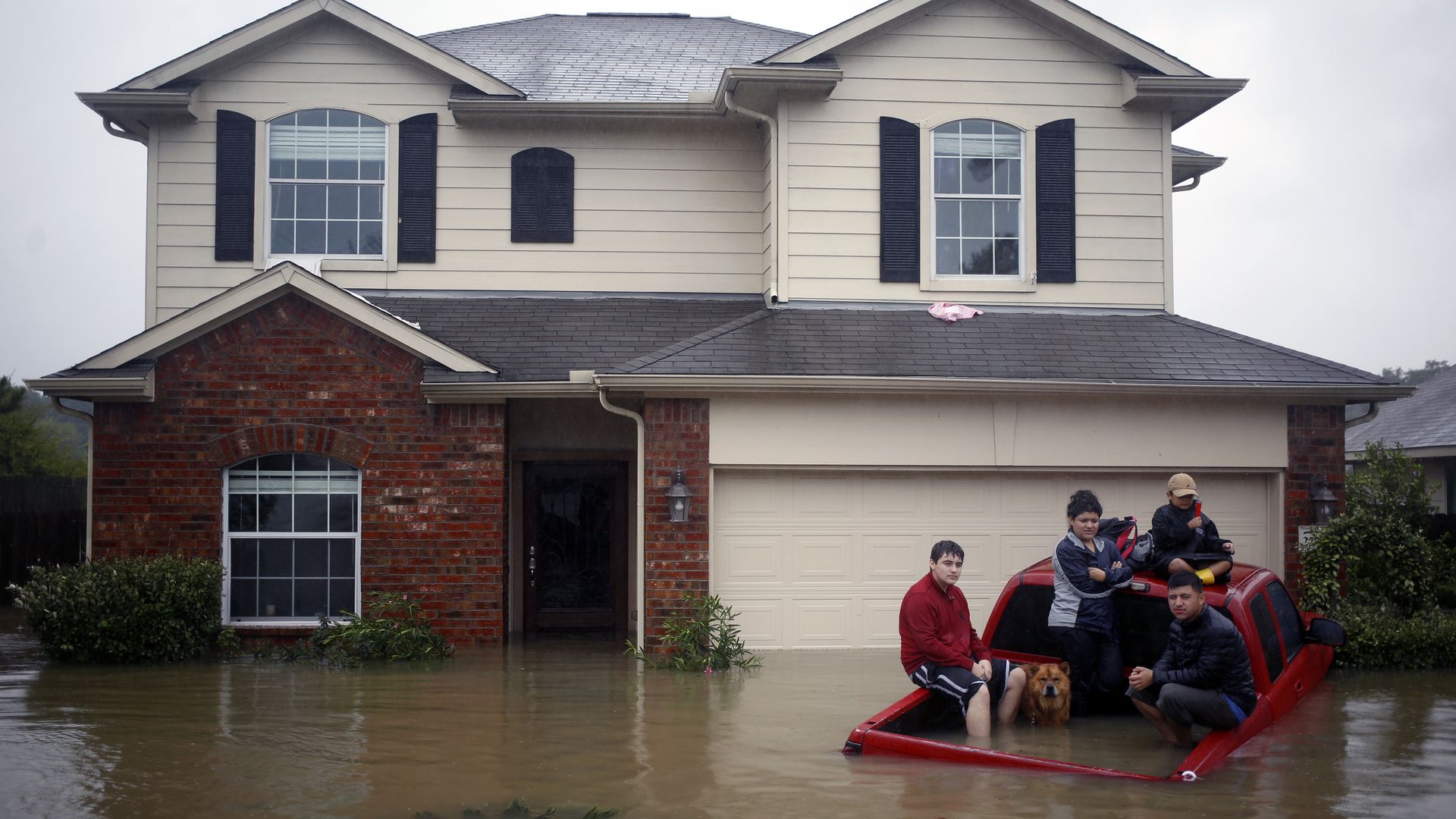 Floodwaters inundate a home in Spring, Texas during Hurricane Harvey in 2017.