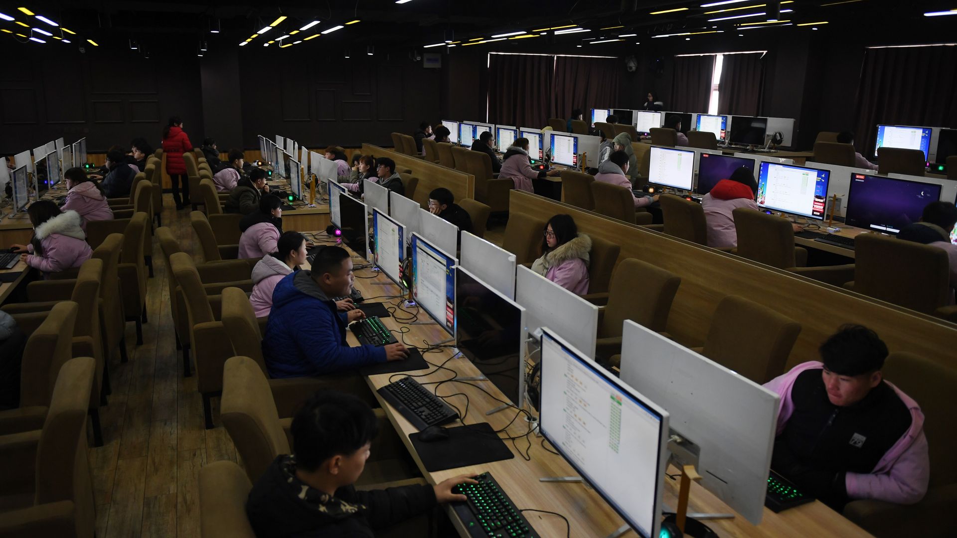 Students sit an exam in a computer room at a technical school in Jinan, in China's eastern Shandong province on January 29, 2018.