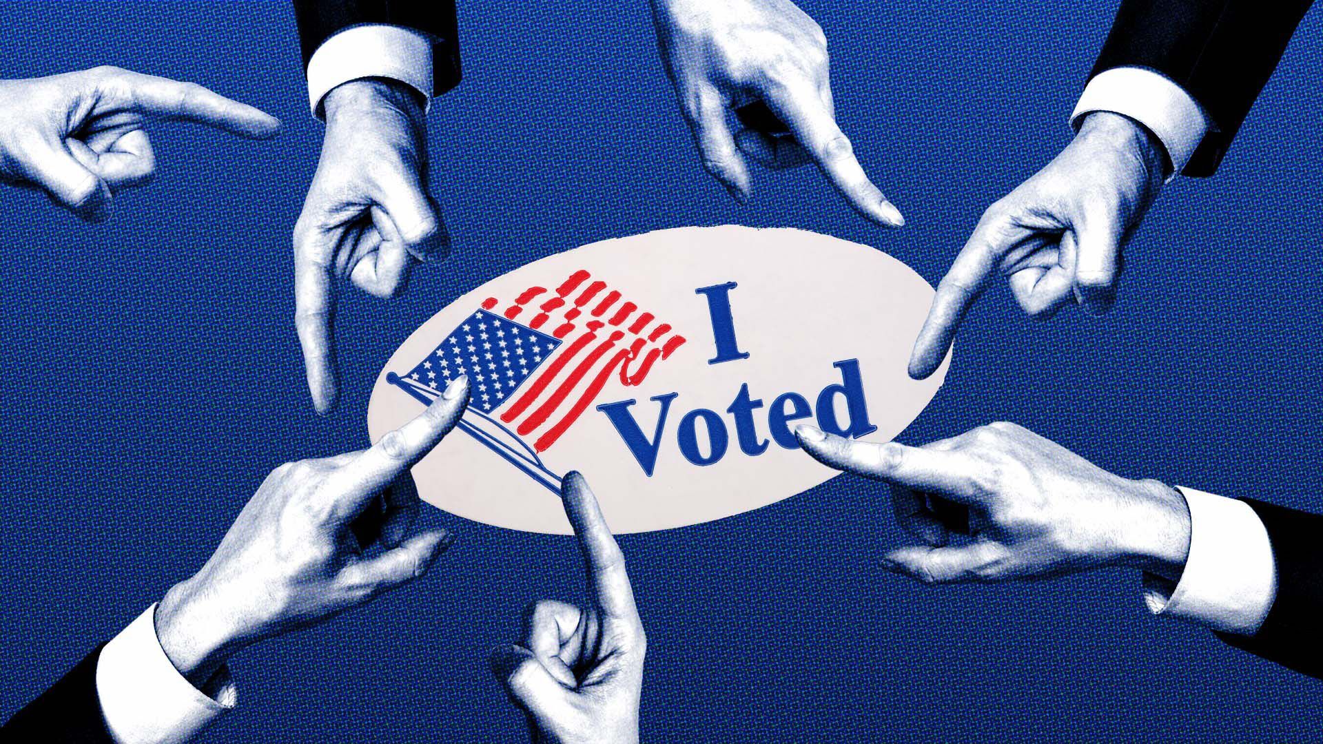 In this image, a group of hands point at an "I Voted" sticker