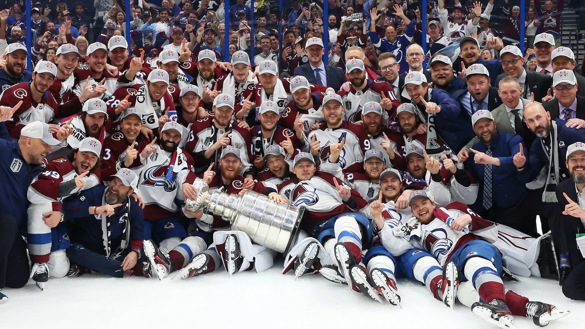 The Colorado Avalanche pose with the Stanley Cup.