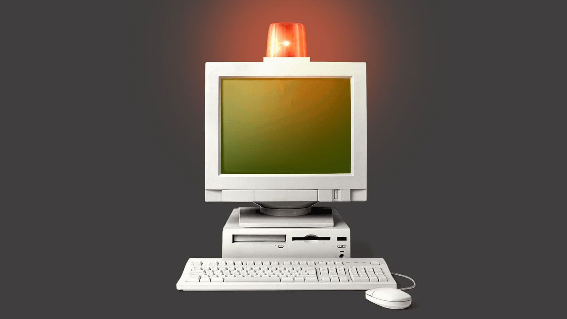 Illustration of a siren flashing on top of a computer.