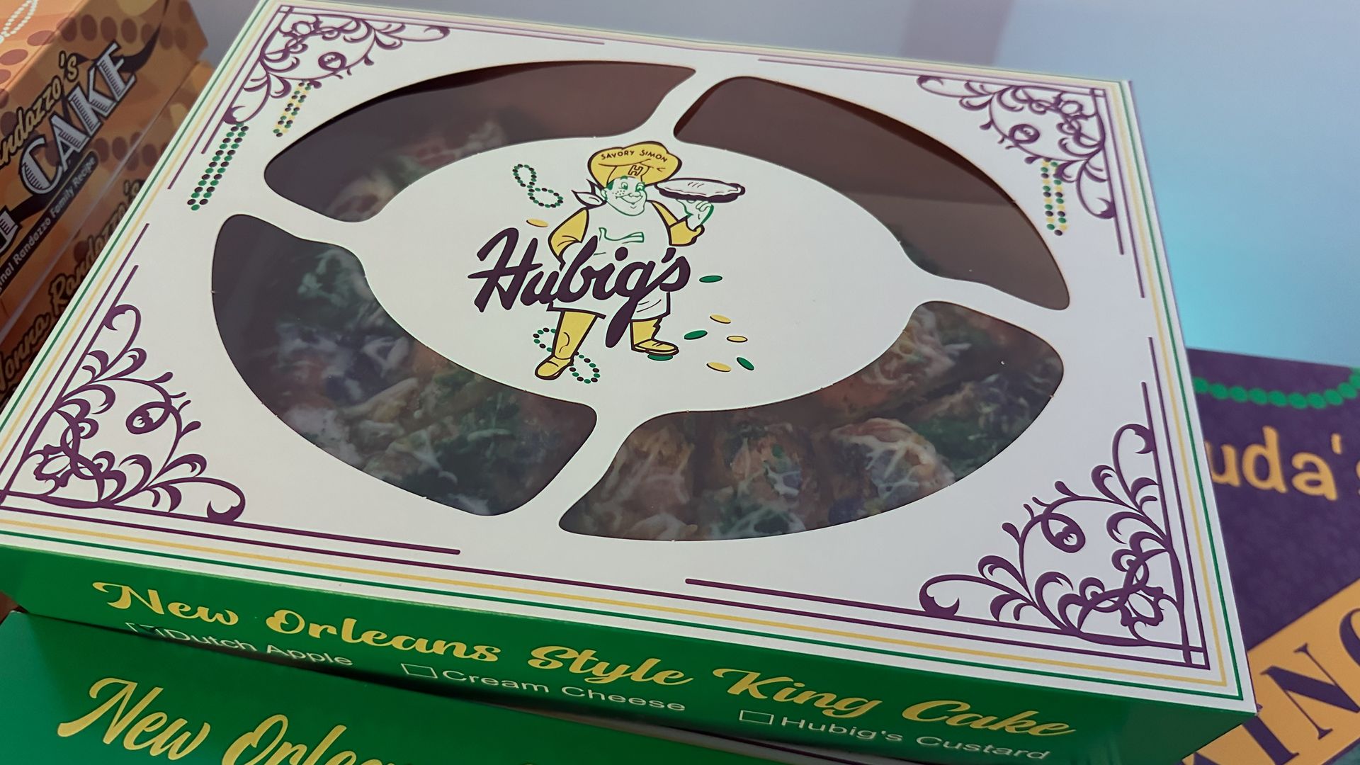 A king cake box with the Hubig's logo.