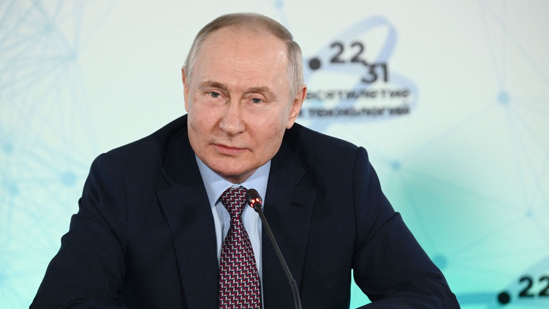 Vladimir Putin attends a meeting
