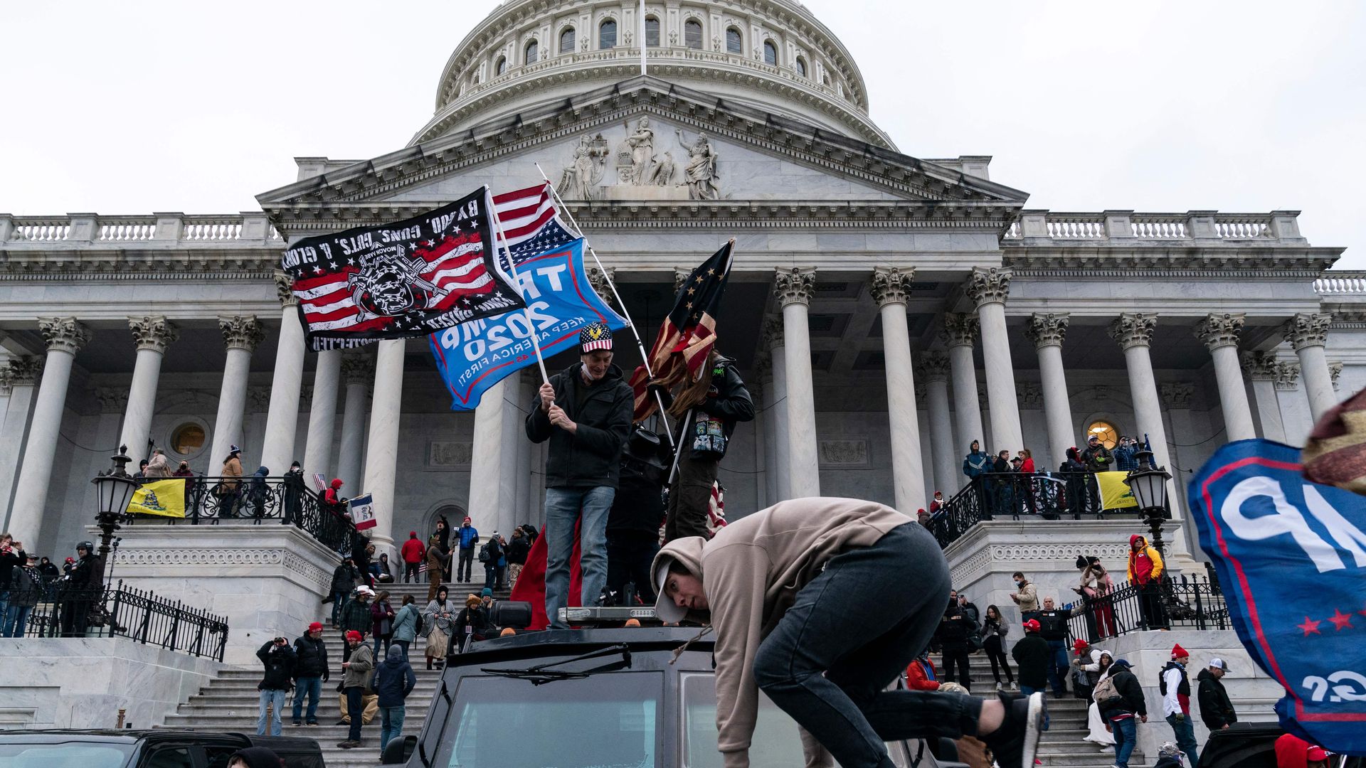 Supporters of US President Donald Trump protest outside the US Capitol on January 6, 2021, in Washington, DC. - Demonstrators breeched security and entered the Capitol as Congress debated the a 2020 presidential election Electoral Vote Certification. (Photo by ALEX EDELMAN / AFP) (Photo by ALEX EDEL