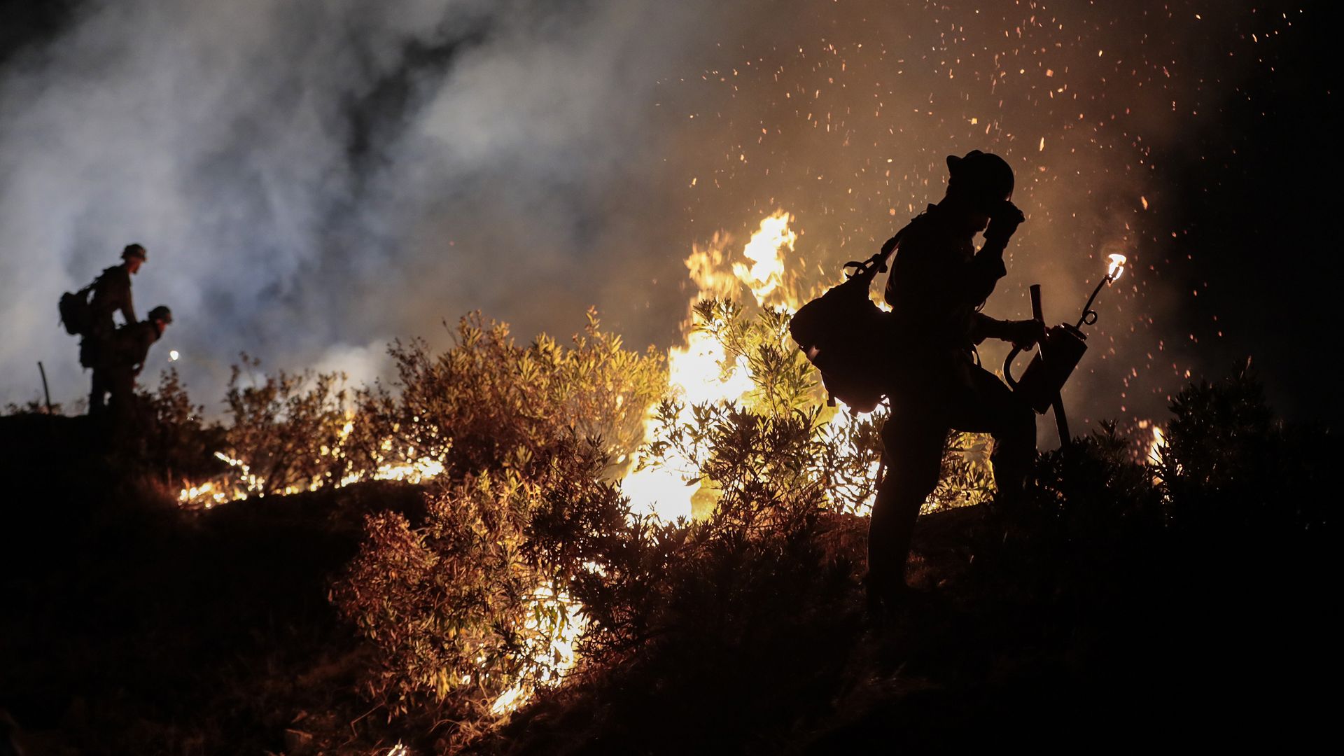 Firefighters battle the Bobcat Fire in California's Angeles National Forest on Sept. 22.