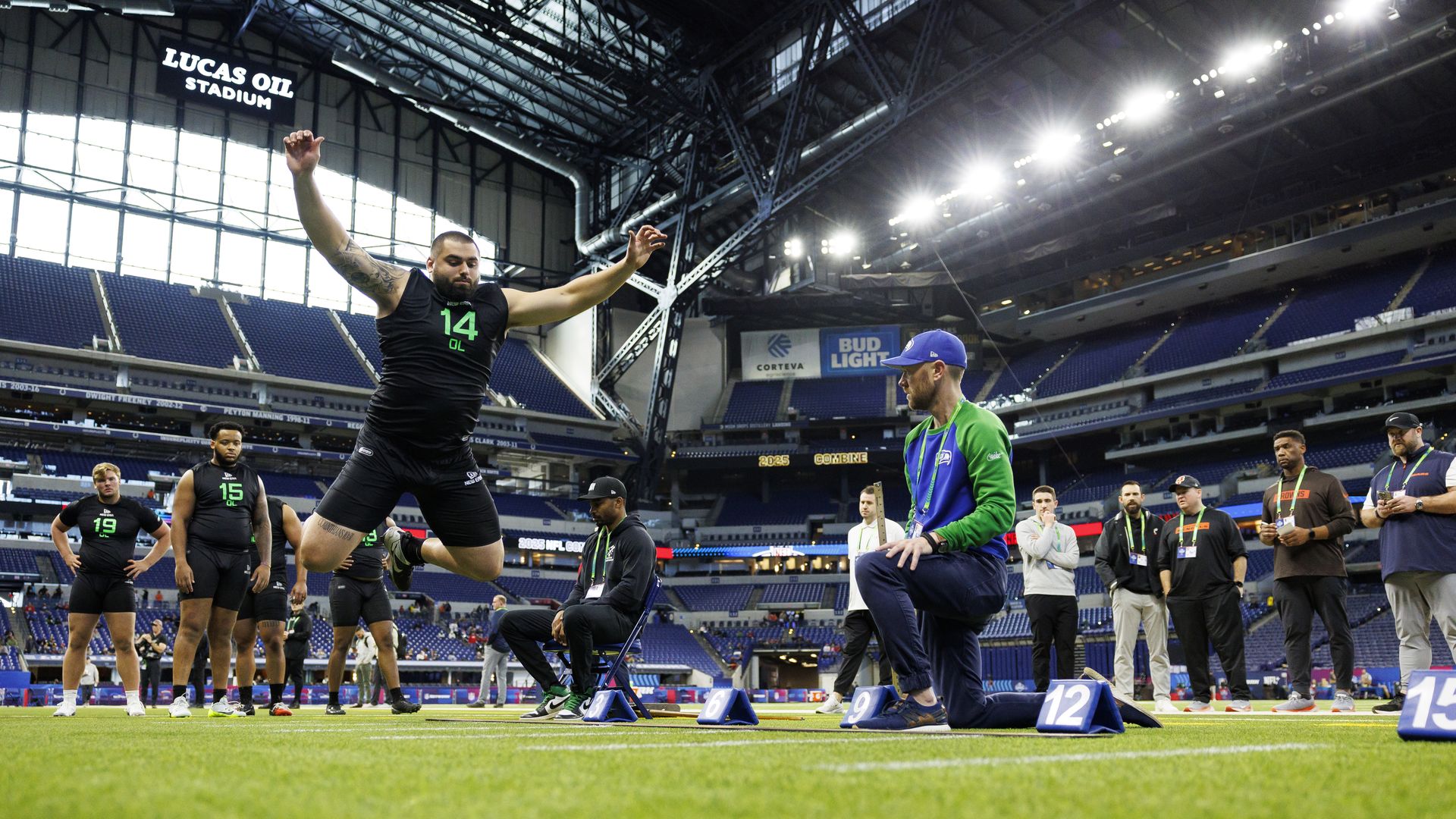 INDIANAPOLIS, INDIANA - MARCH 2: Dylan Fairchild #OL14 of Georgia participates in the broad jump during the NFL Scouting Combine at Lucas Oil Stadium on March 2, 2025 in Indianapolis, Indiana. (Photo by Brooke Sutton/Getty Images)
