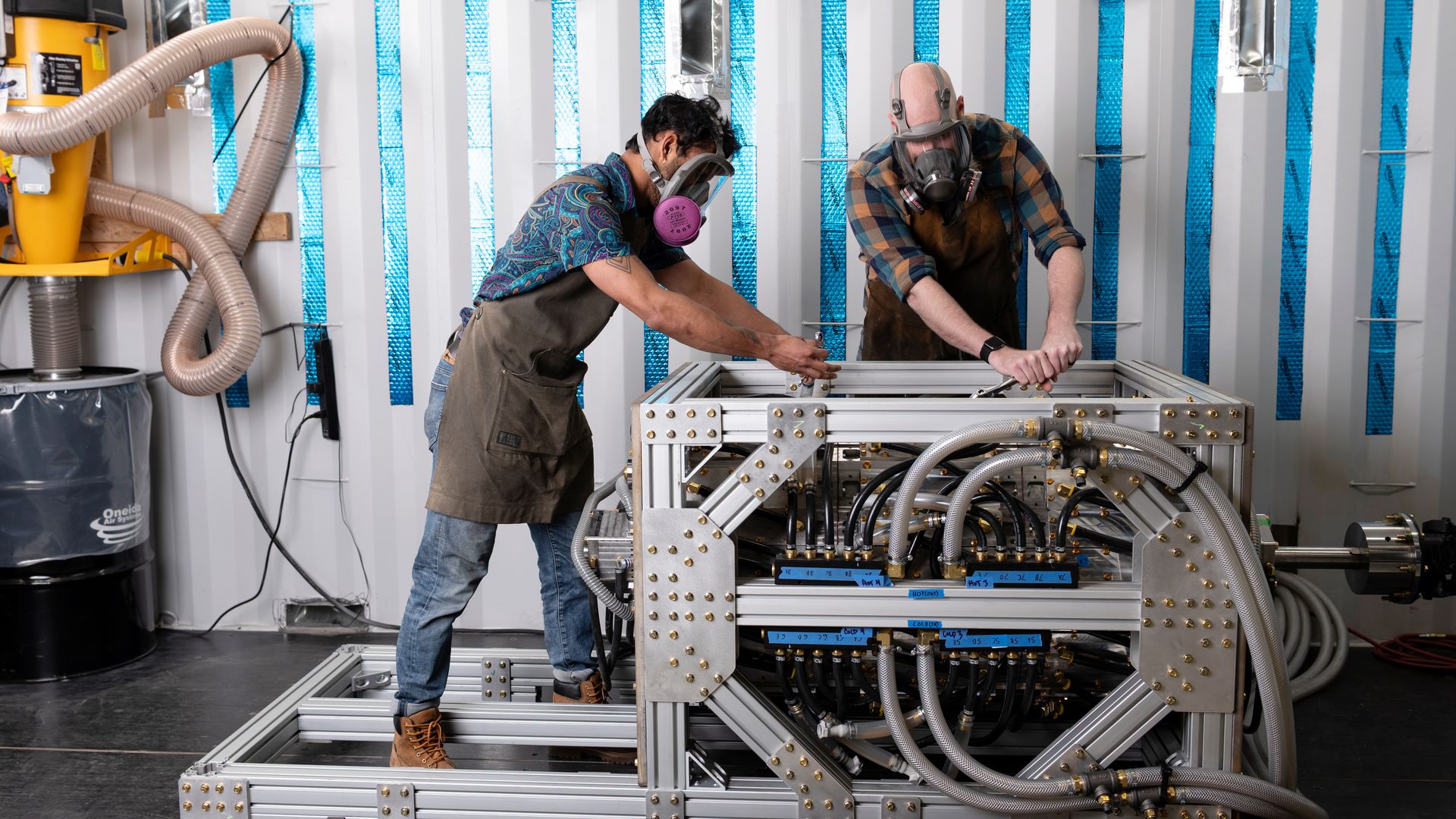 A machine that grinds down forever chemicals and cleans toxic soil, in a warehouse in Oakland, Calif.