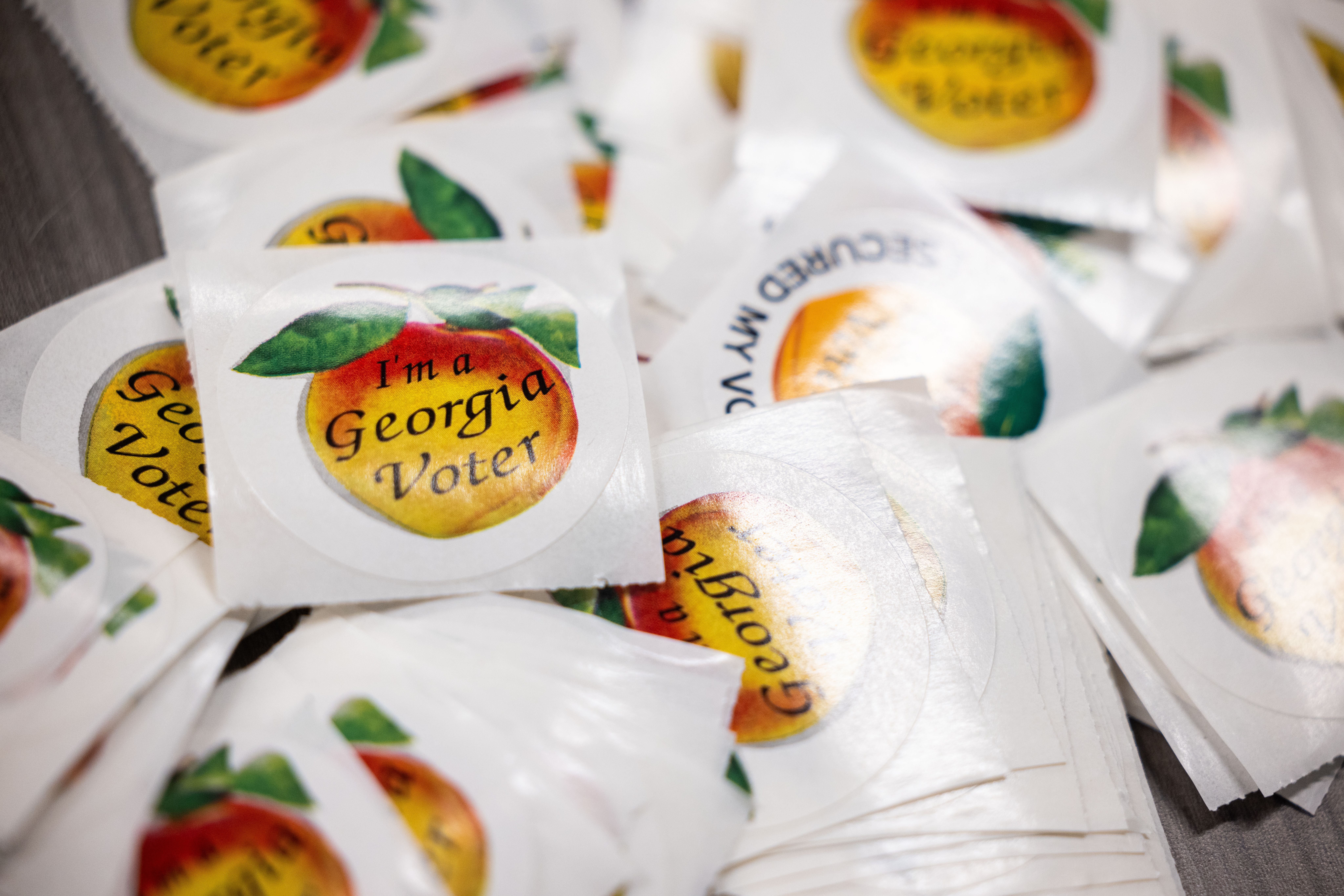 Photo shows peach stickers.