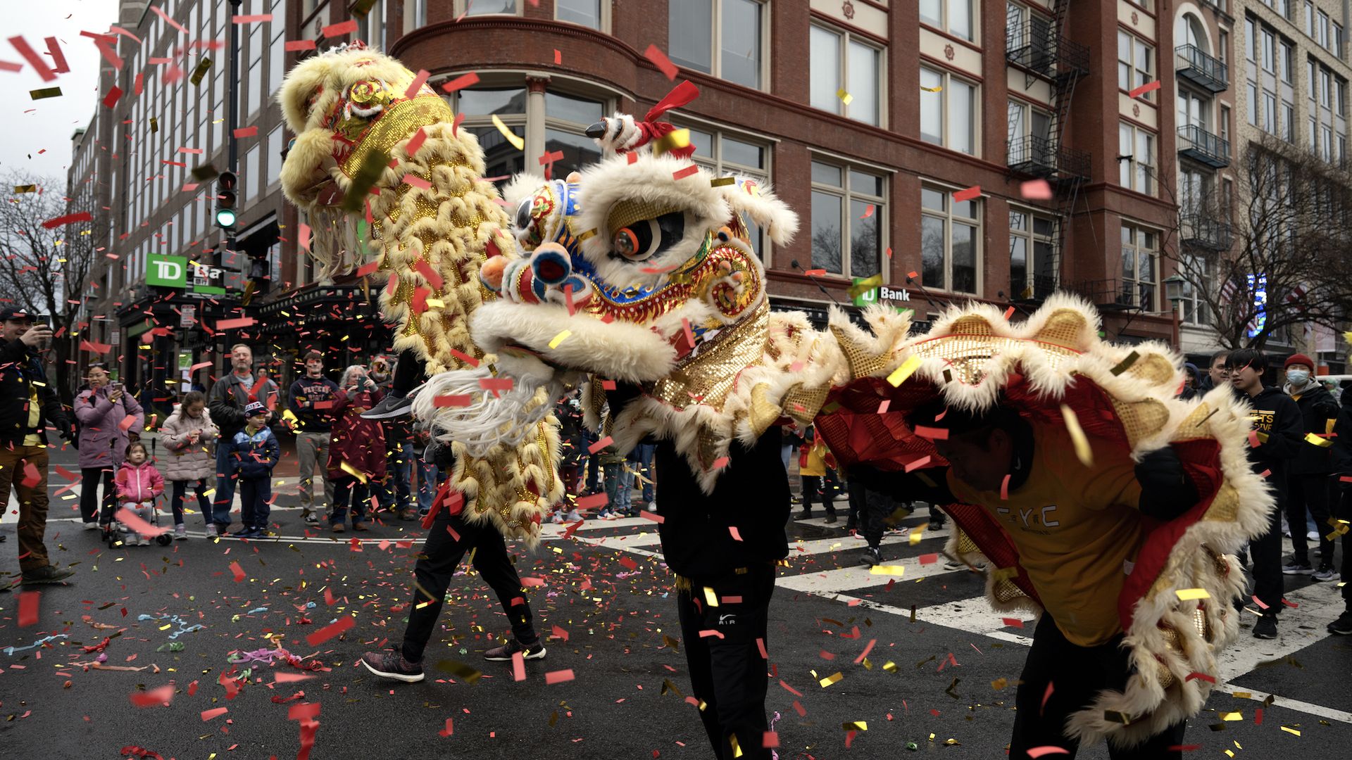 A dragon from the Chinese Youth Club Lion Dance Troupe performing before thousands of spectators on 7th Street during the DC Chinese Lunar New Year Parade Chinatown in Washington, DC on January 22, 2023. (Photo by Marvin Joseph/The Washington Post via Getty Images)