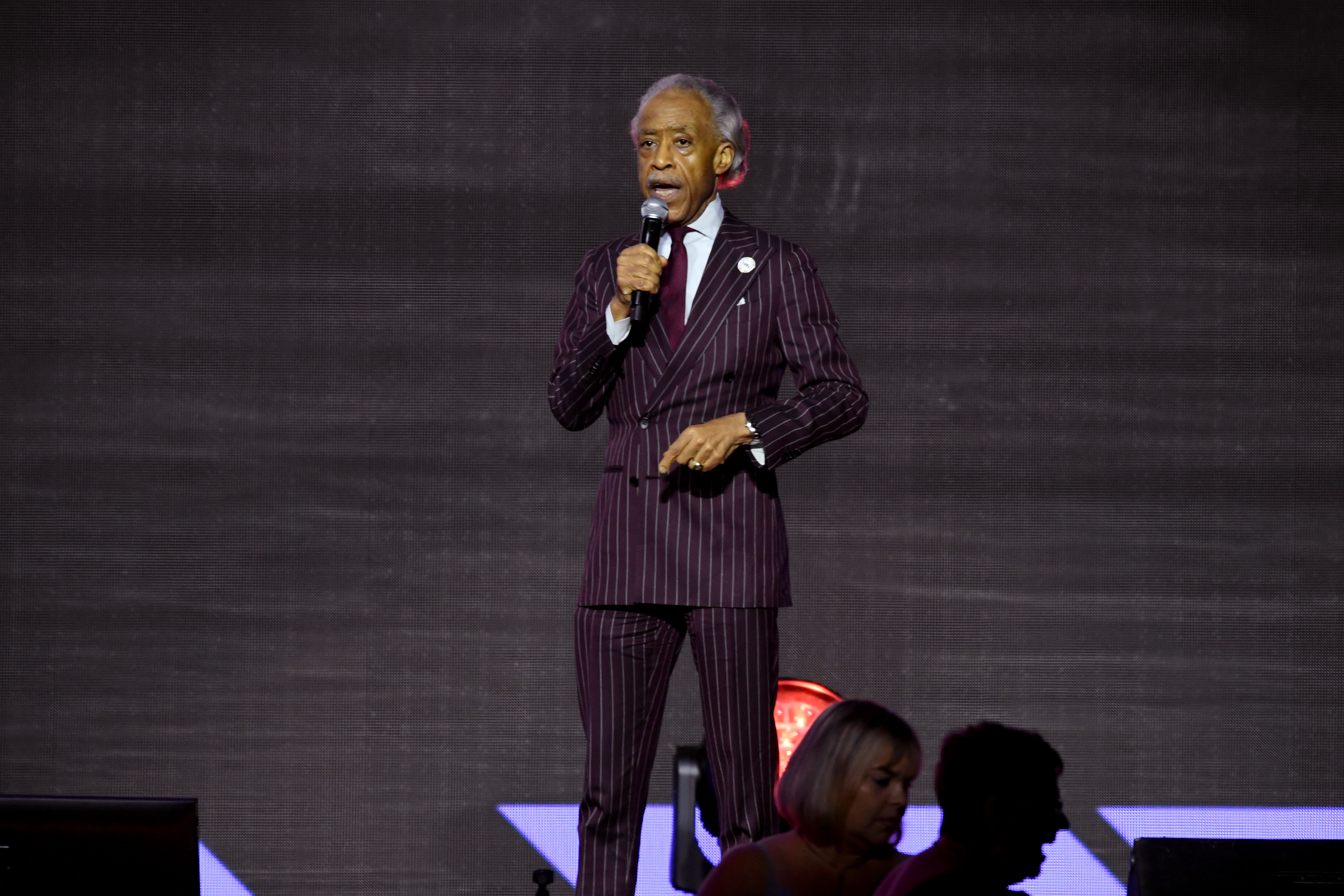 Al Sharpton talks onstage at Essence.