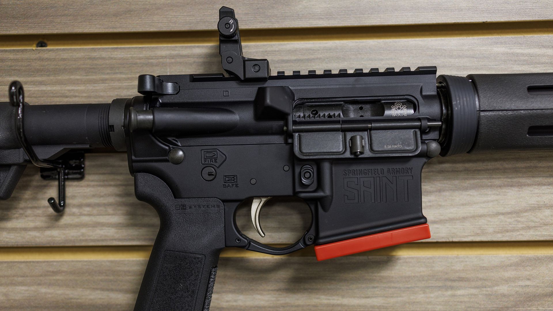 A Springfield Armory AR-15-style rifle on the wall at Voodoo Firearms on Jan. 24, 2023, in Minooka, Ill. 
