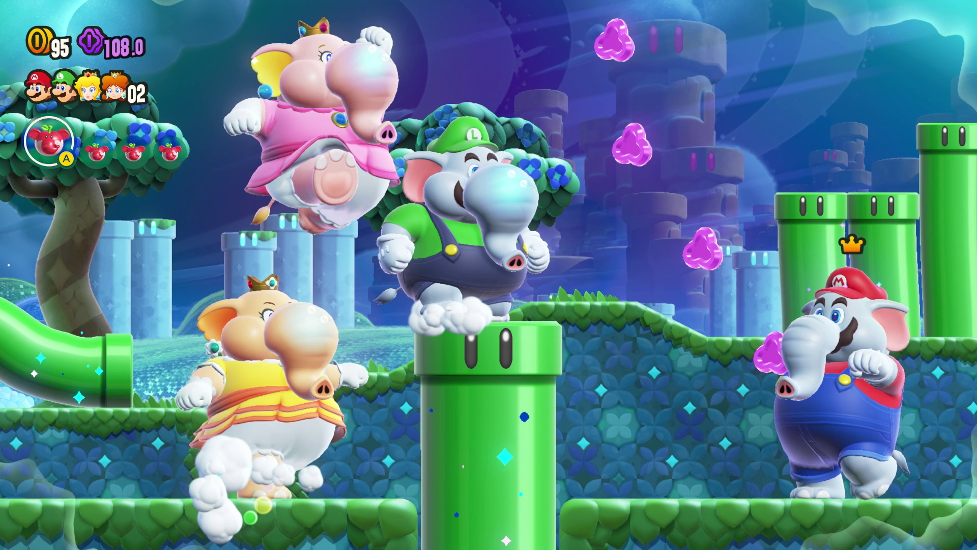 Video game screenshot of four Mario characters that have been transformed into elephants standing near a green pipe