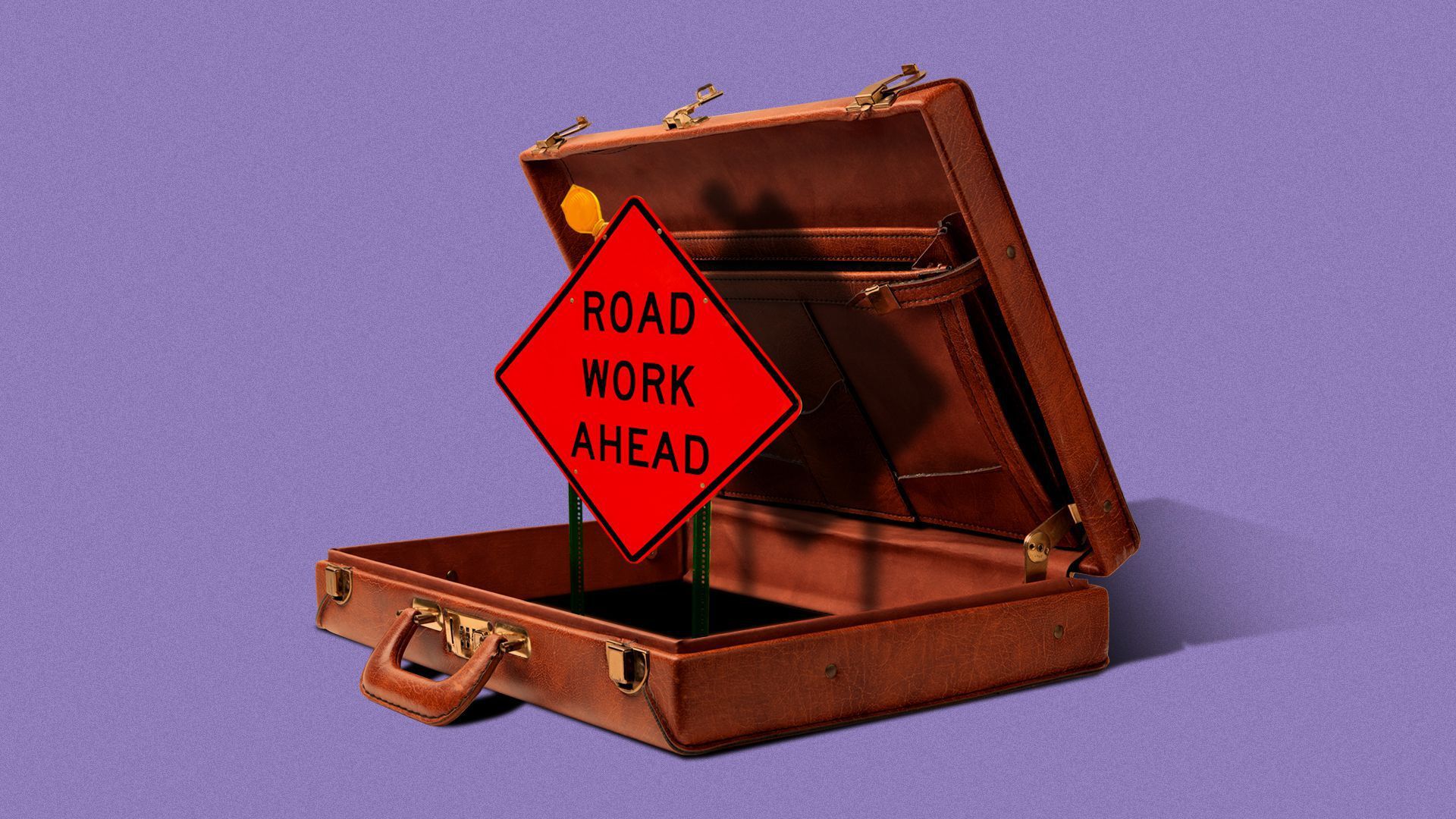 A briefcase with a "Road Work Ahead" sign in it/ 
