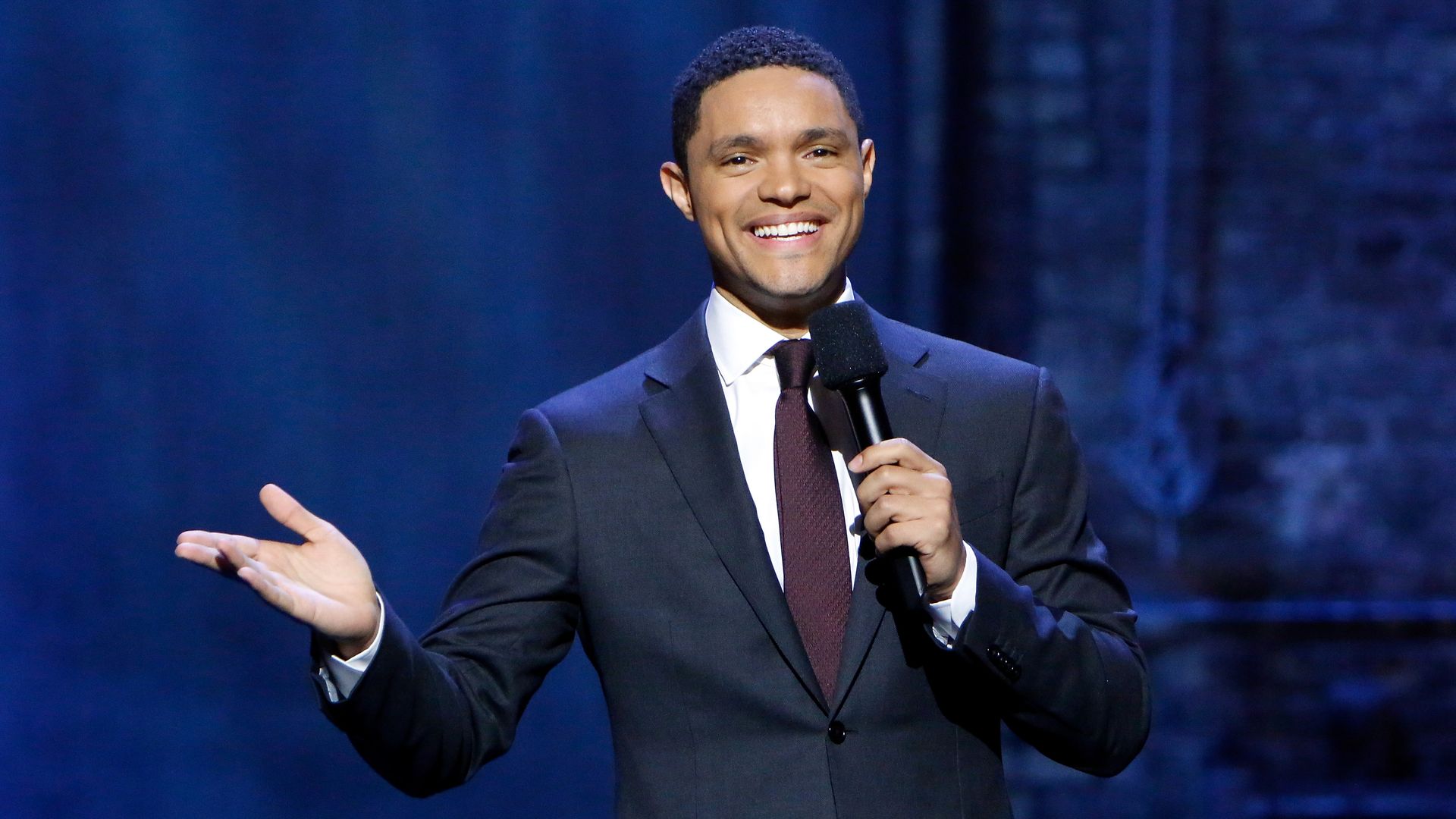 Trevor Noah speaks at a comedy event in 2017.