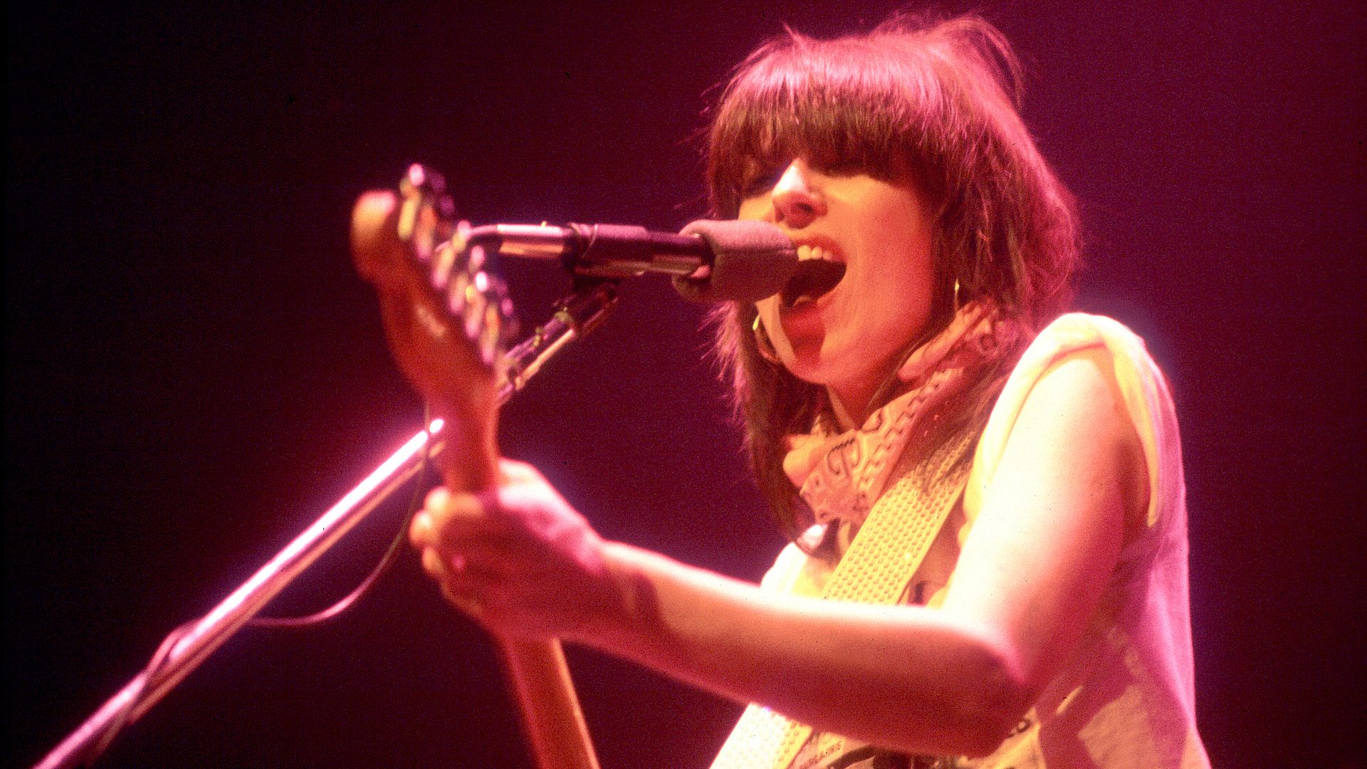Musician Chrissie Hynde performs on stage. 