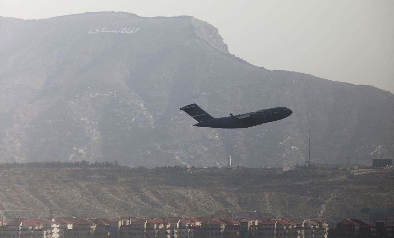 A plane takes off from Kabul, Afghanistan on August 24
