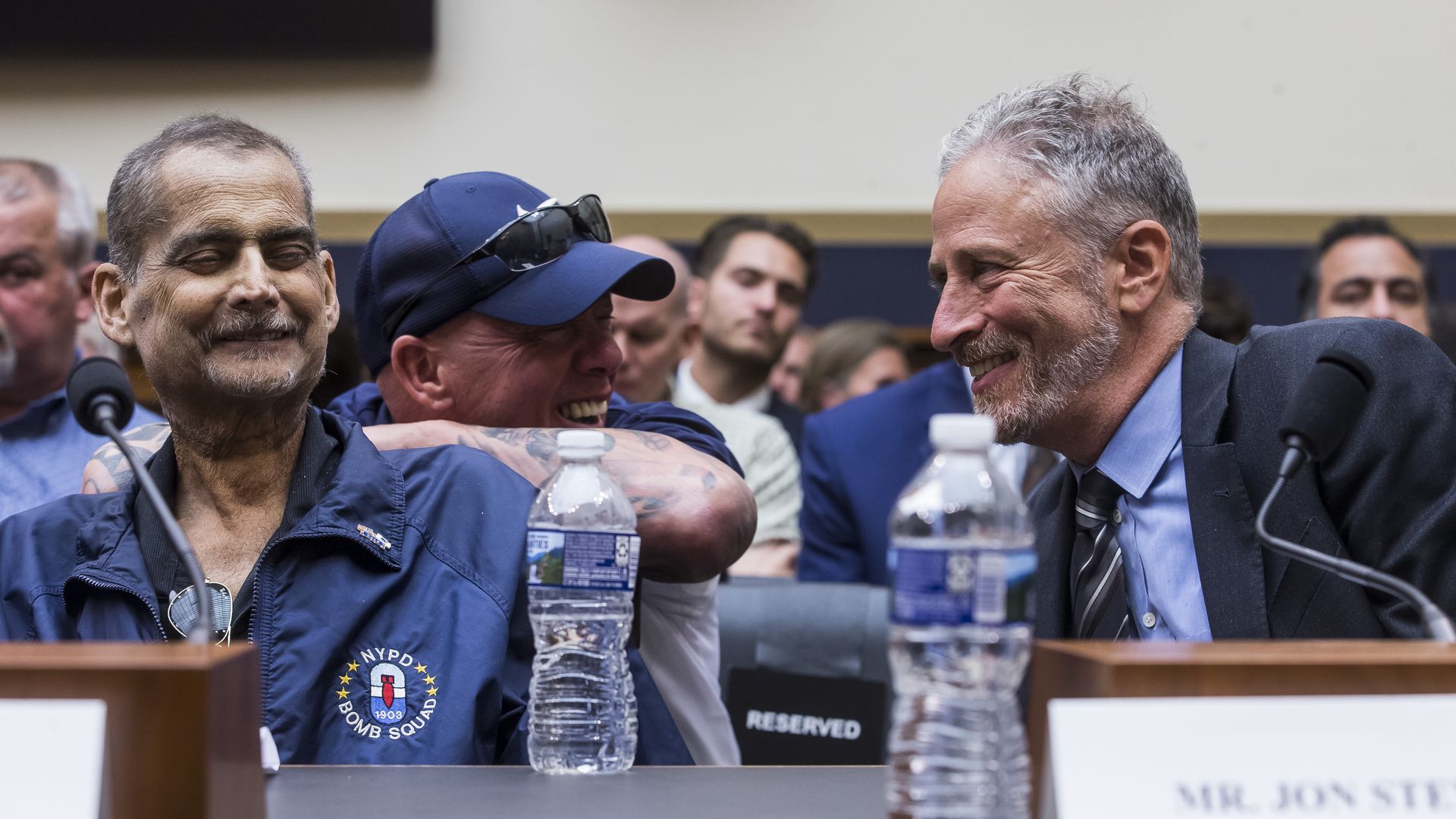 Former Daily Show host Jon Stewart speaking to a 9/11 first responder at the House Judiciary Committee meeting