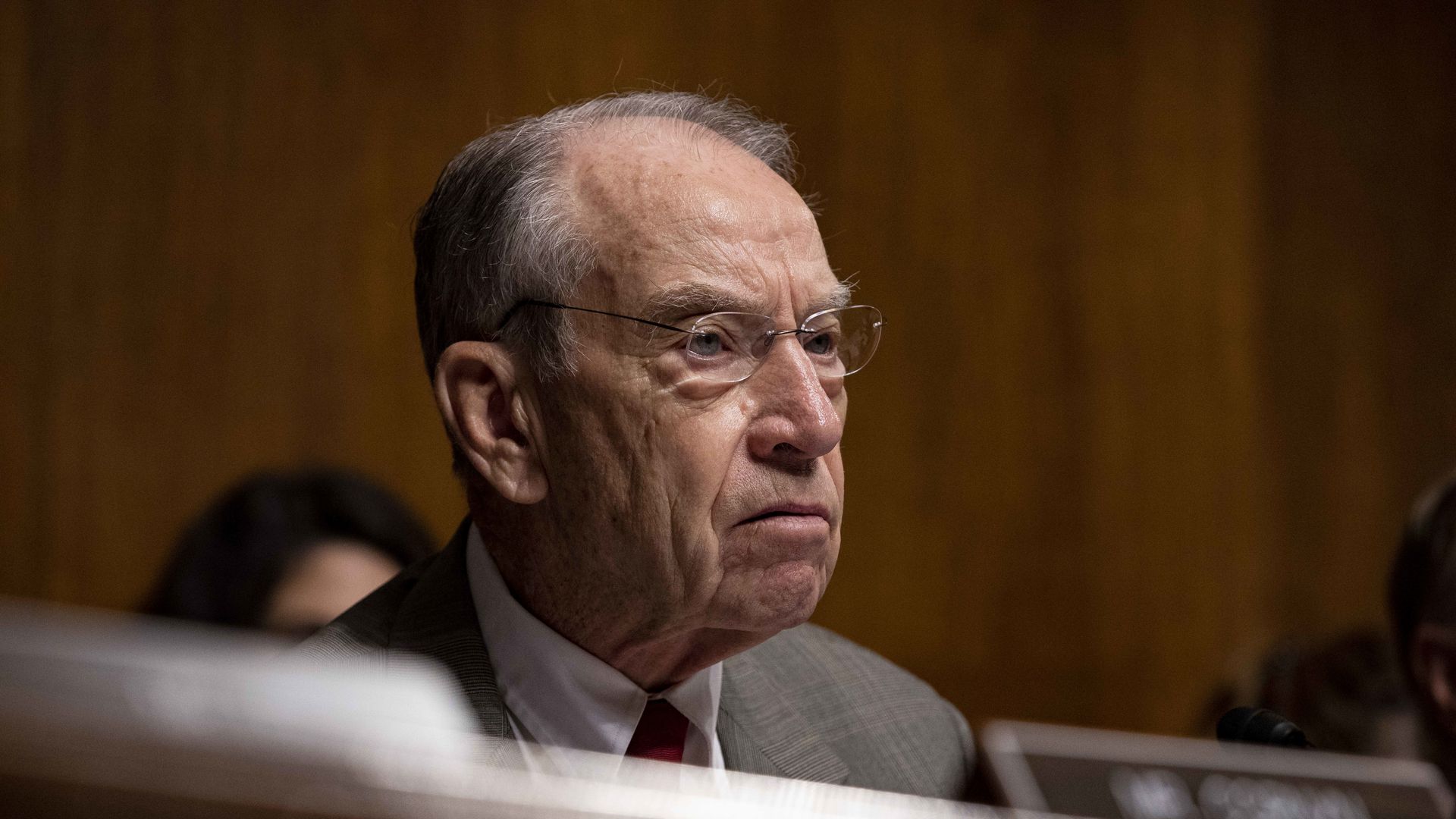Senator Chuck Grassley sitting on a dais.